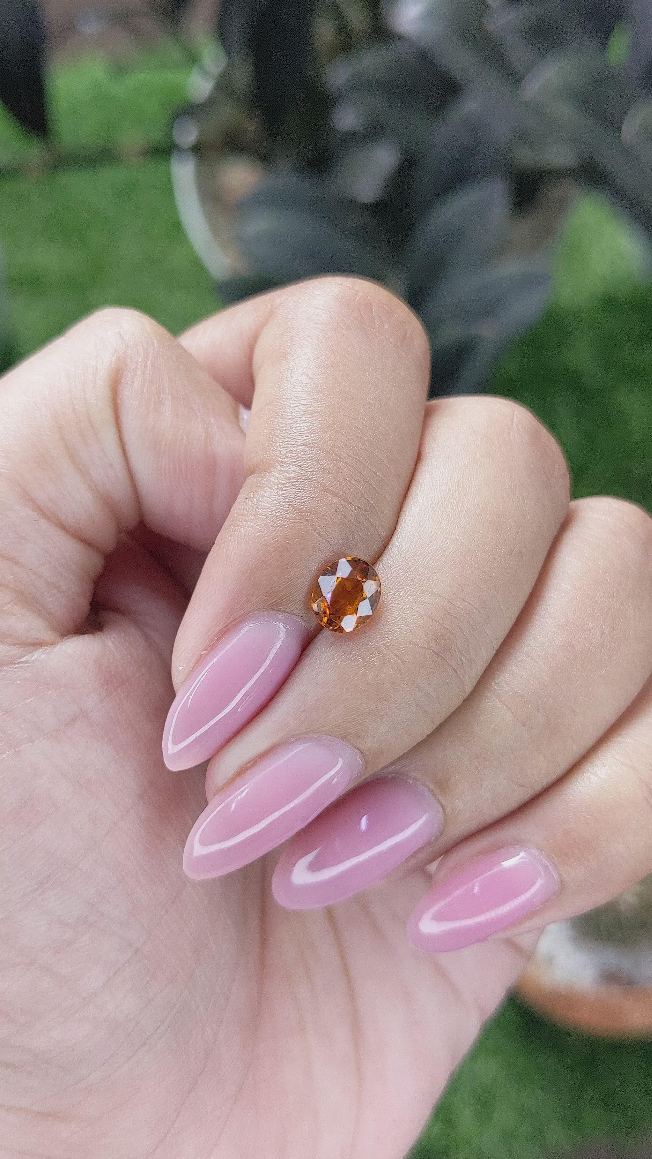 0.94 Ct. Orange Hessonite Garnet Size Video