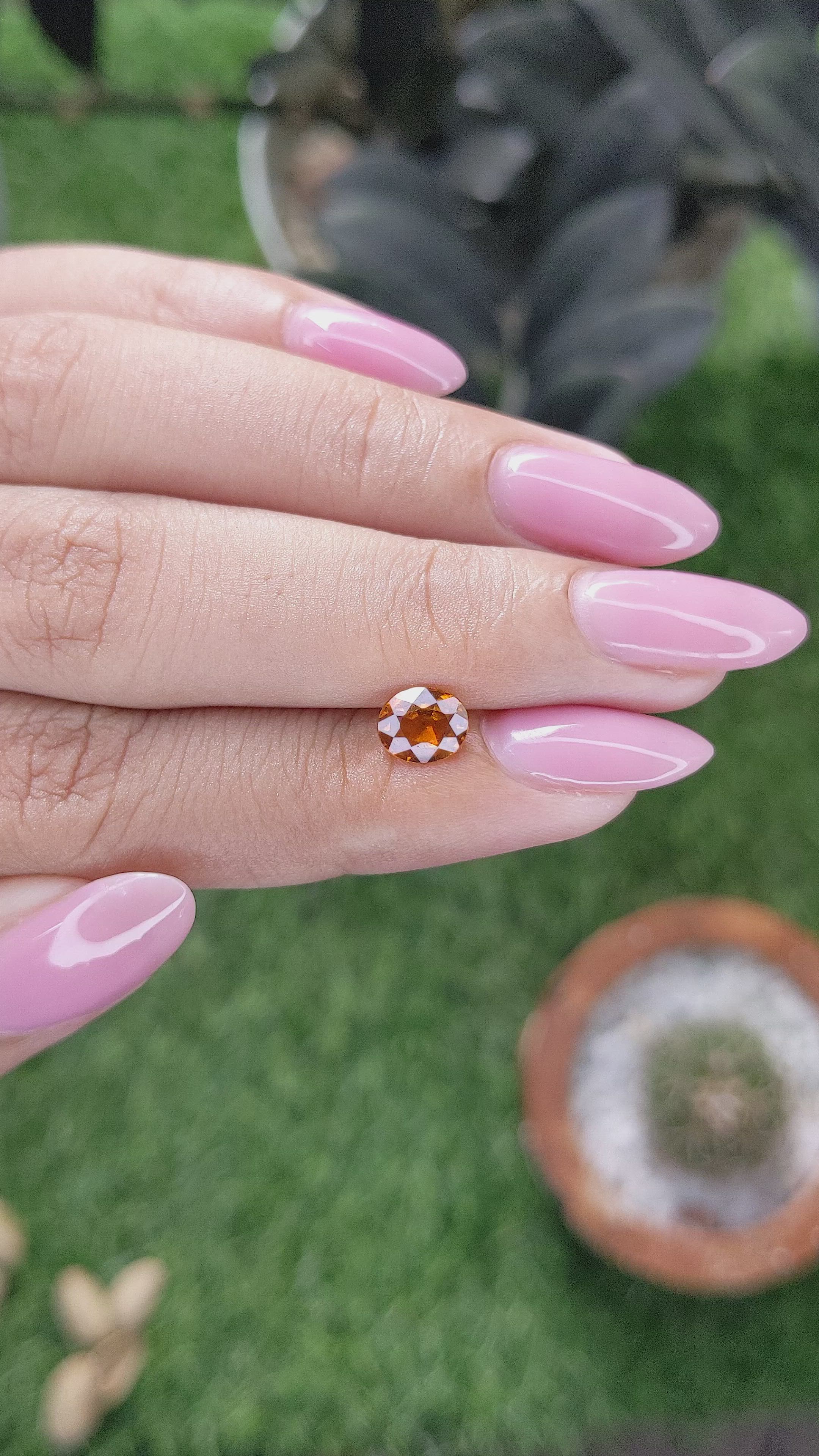 0.94 Ct. Orange Hessonite Garnet Size Video