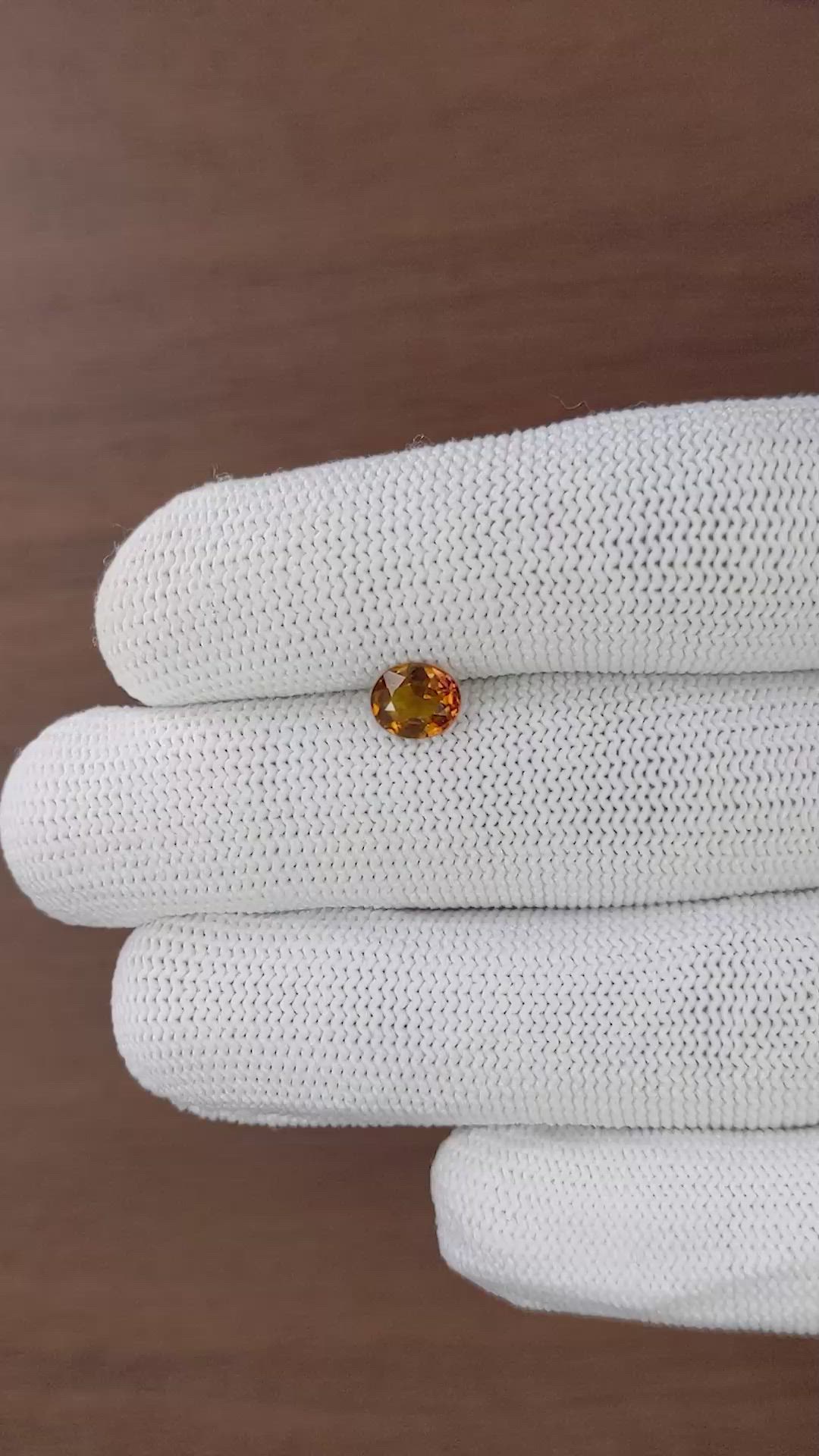 0.94 Ct. Orange Hessonite Garnet Size Video