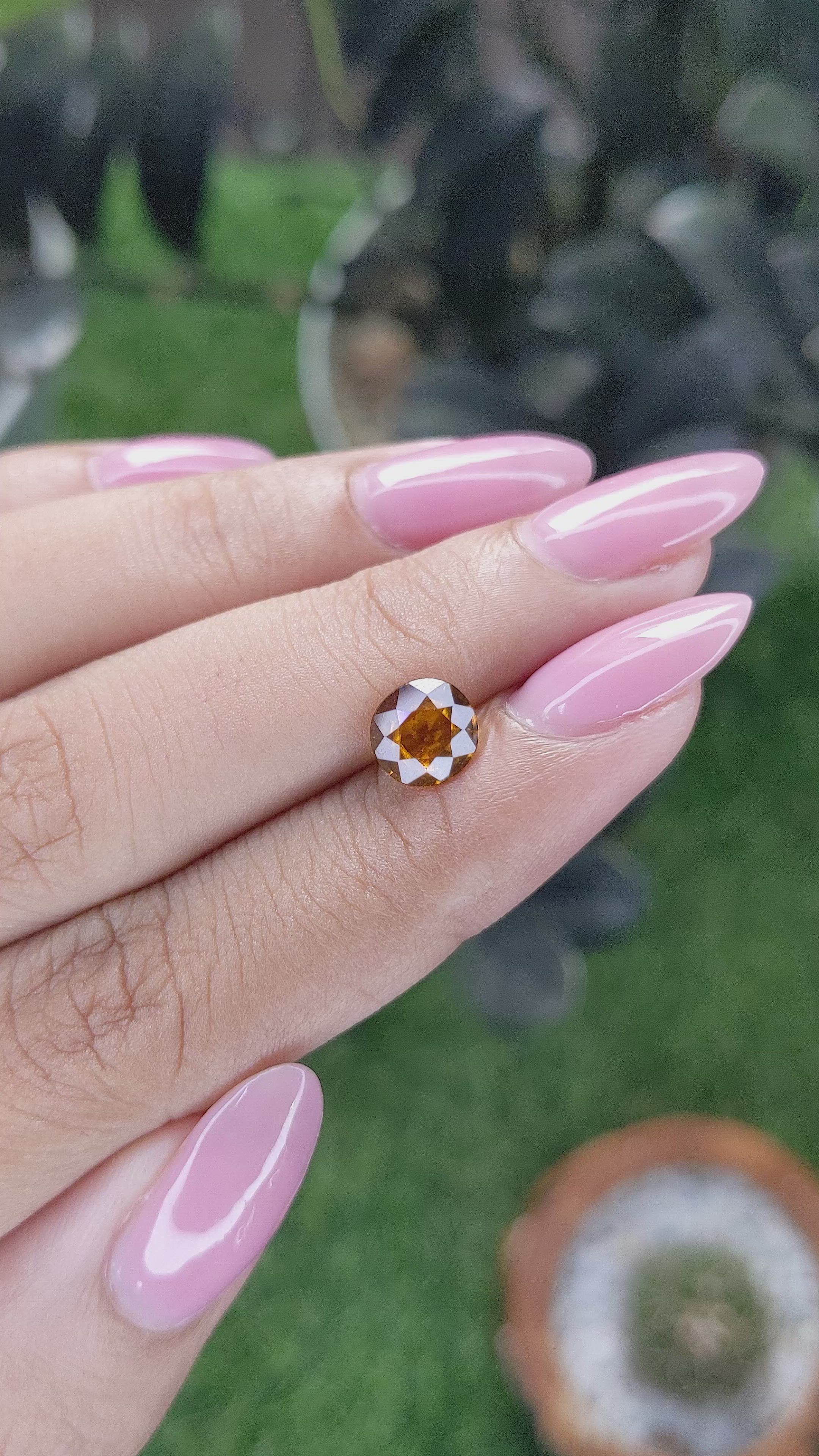 1.39 Ct. Orange Hessonite Garnet Size Video