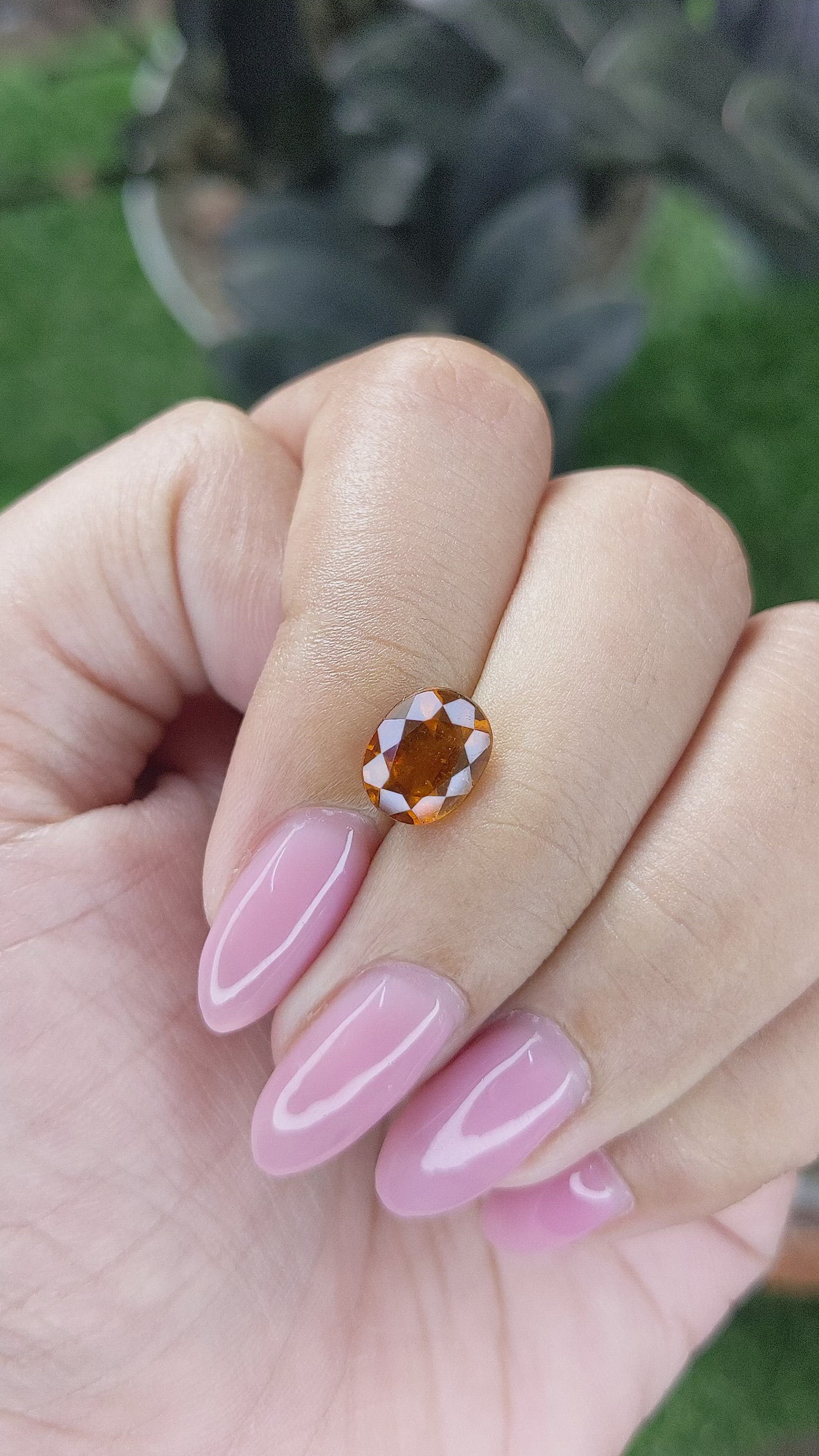 2.33 Ct. Golden Orange Hessonite Garnet Size Video
