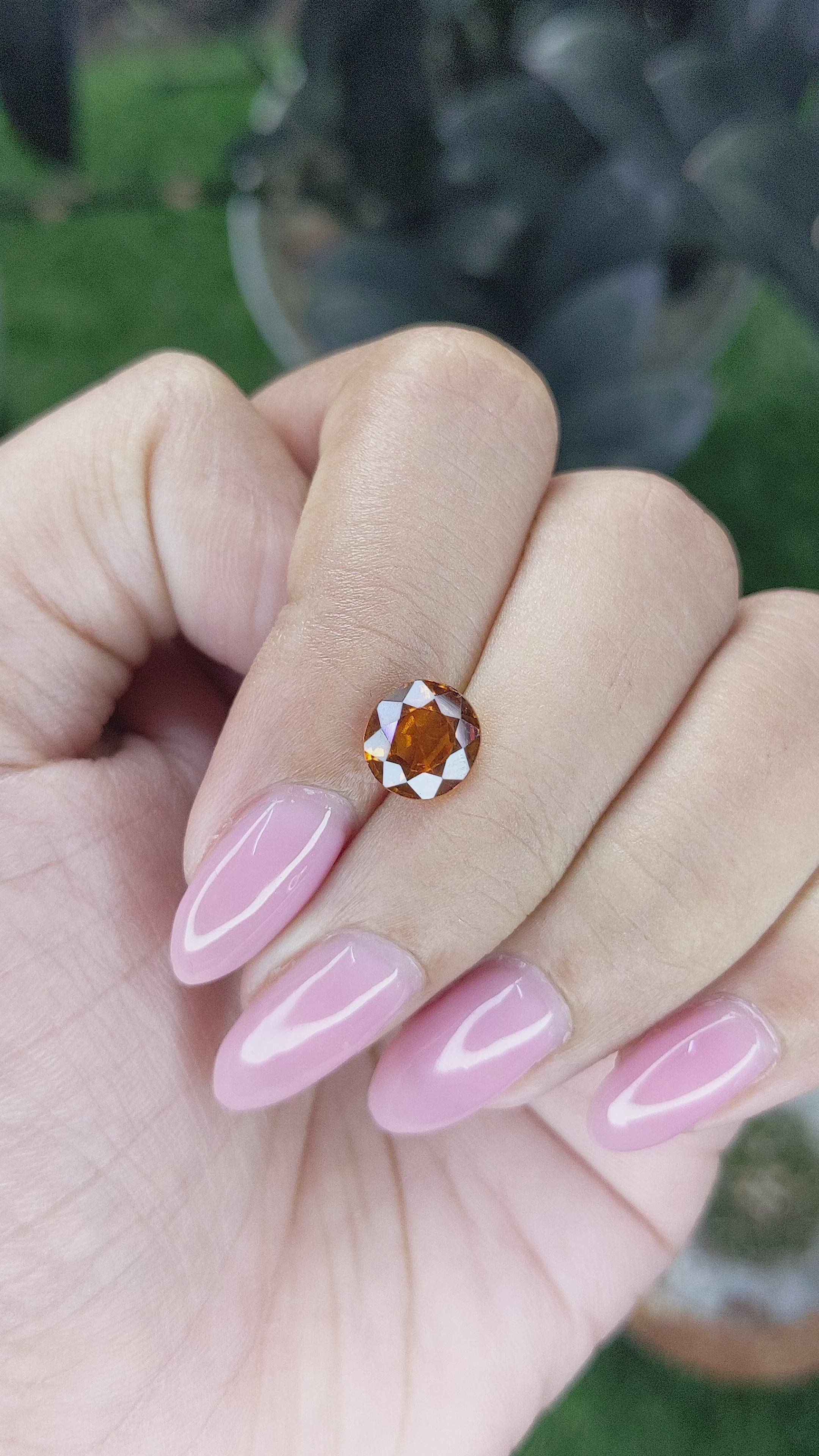 1.87 Ct. Golden Orange Hessonite Garnet Size Video