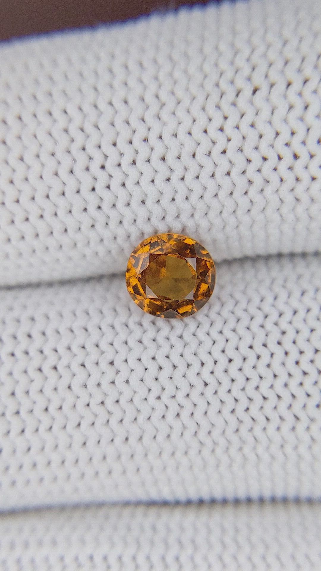 0.94 Ct. Golden Orange Hessonite Garnet Size Video
