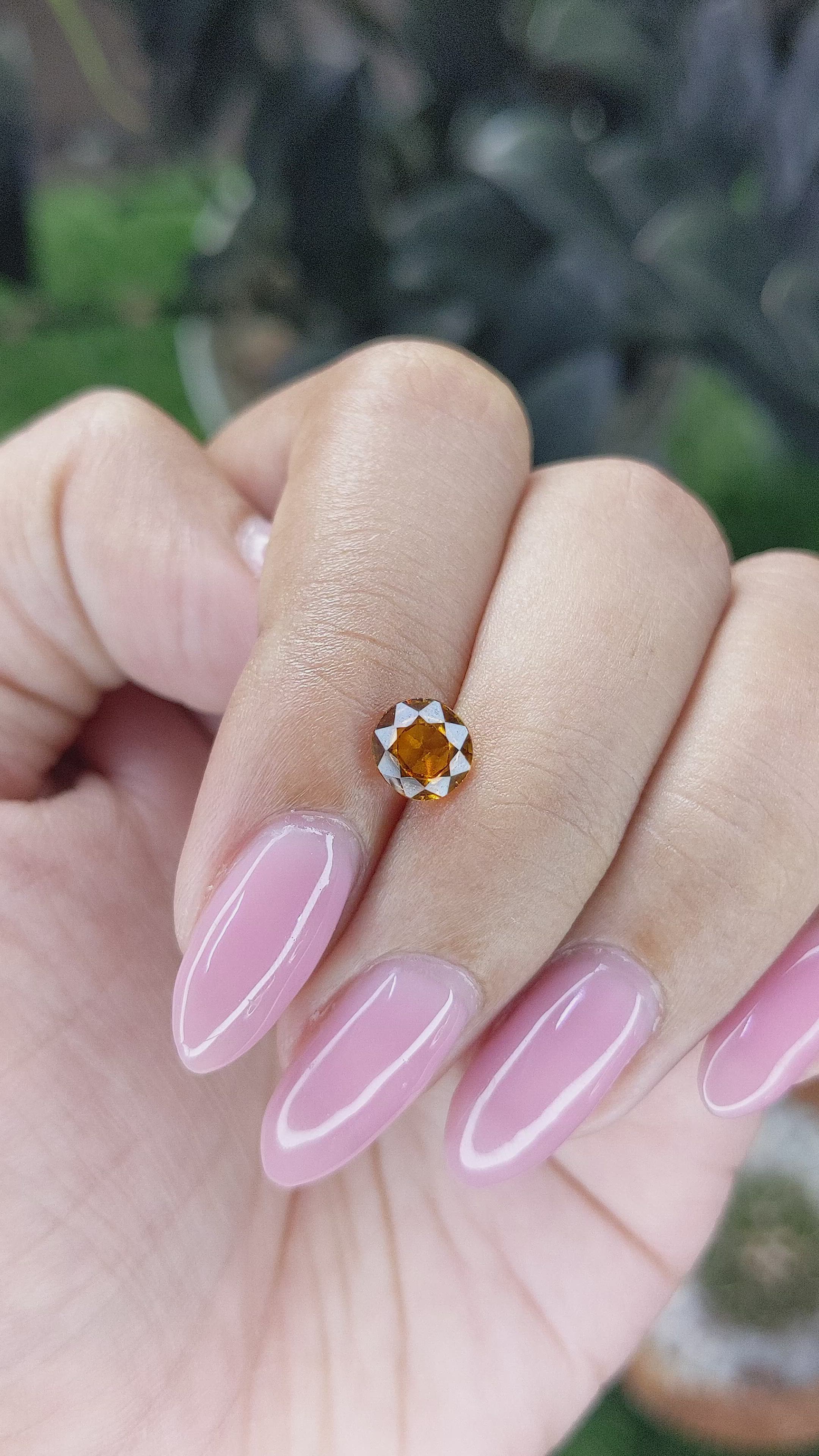 0.94 Ct. Golden Orange Hessonite Garnet Size Video