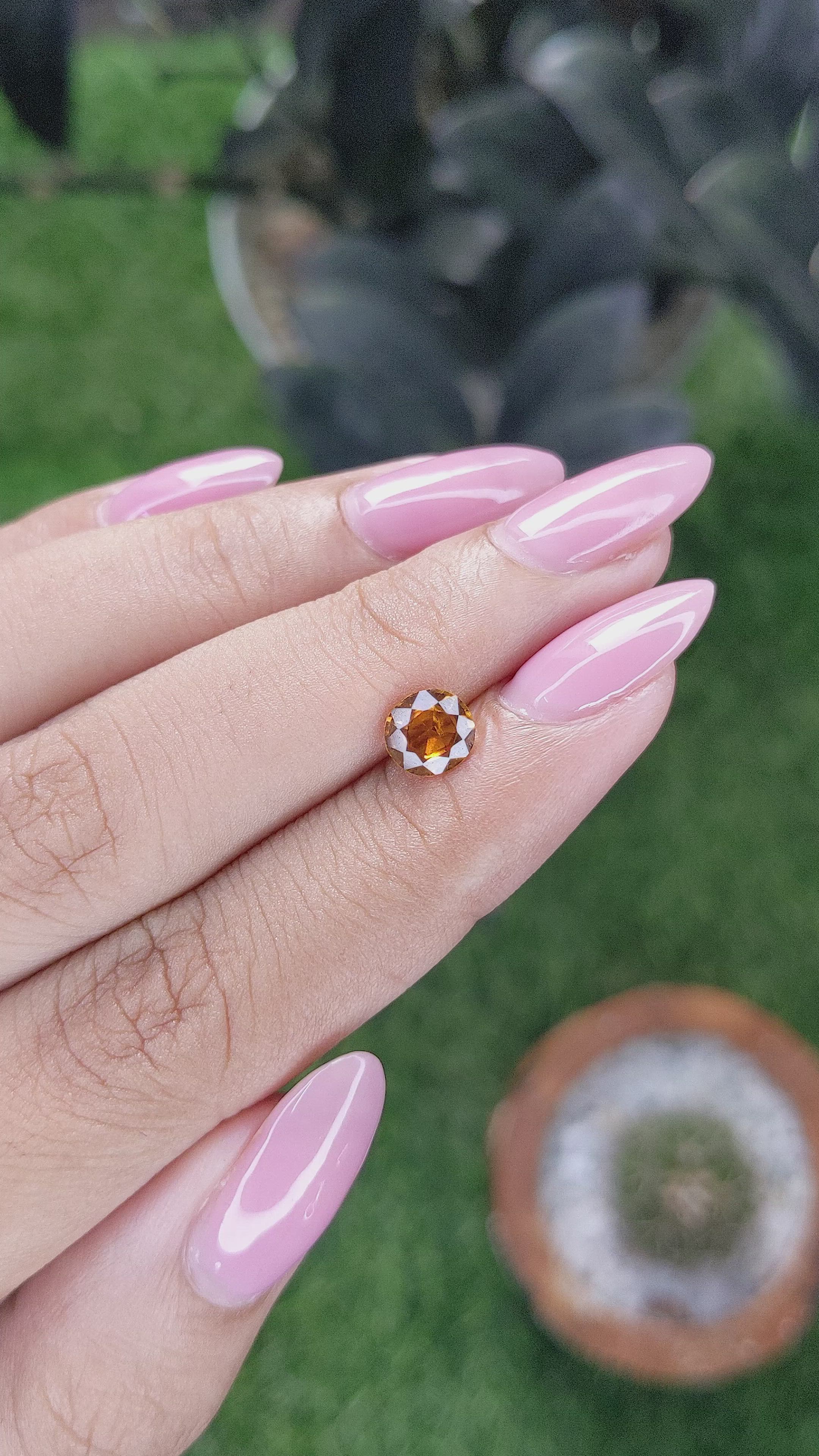0.94 Ct. Golden Orange Hessonite Garnet Size Video