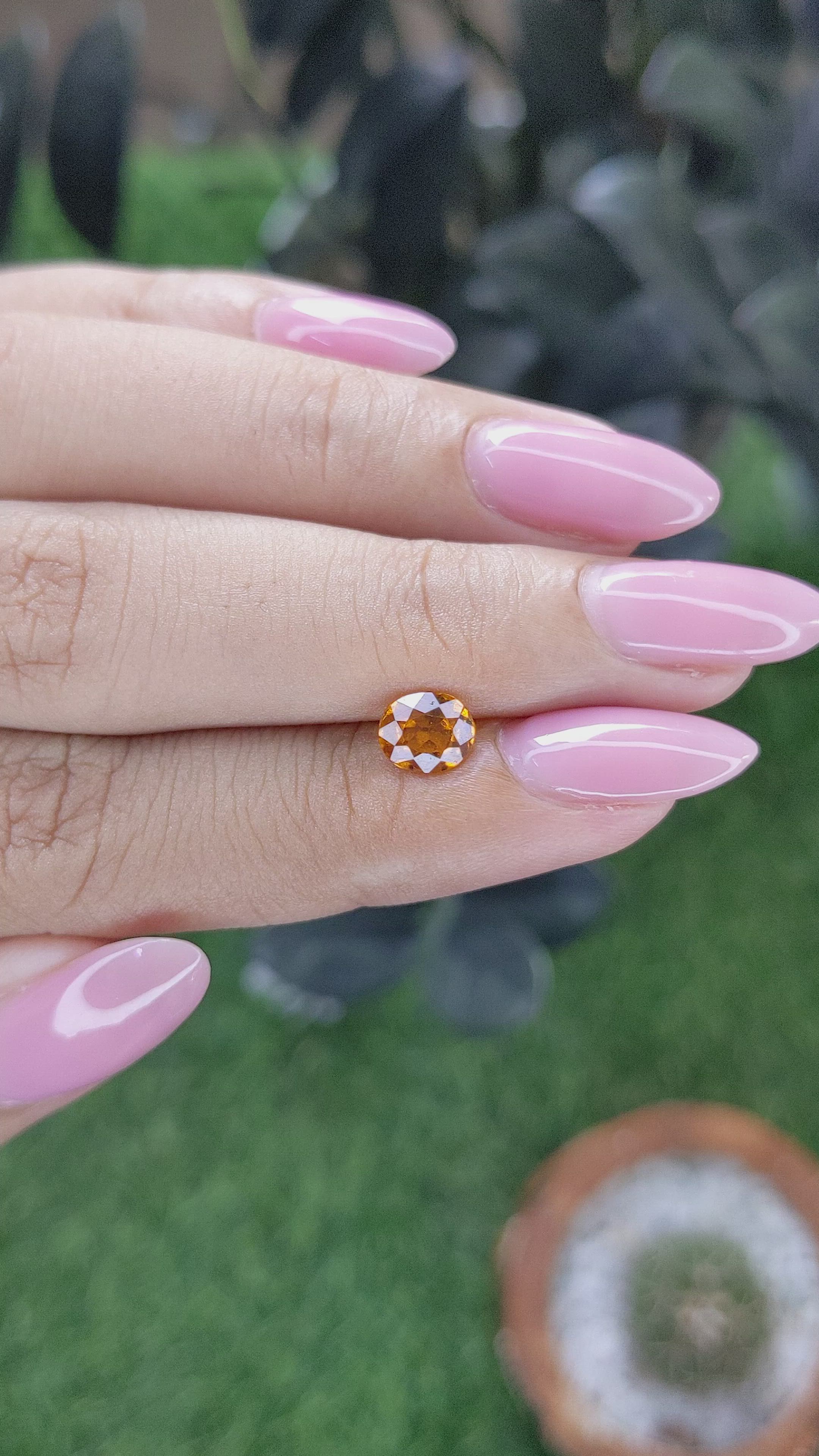 0.96 Ct. Golden Orange Hessonite Garnet Size Video