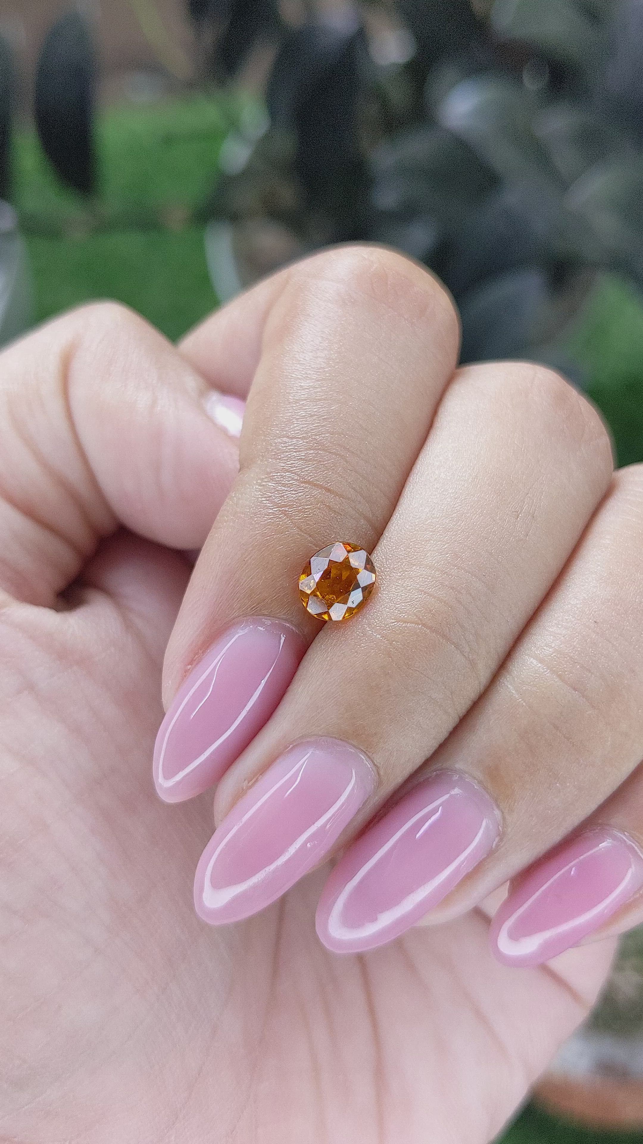 0.96 Ct. Golden Orange Hessonite Garnet Size Video