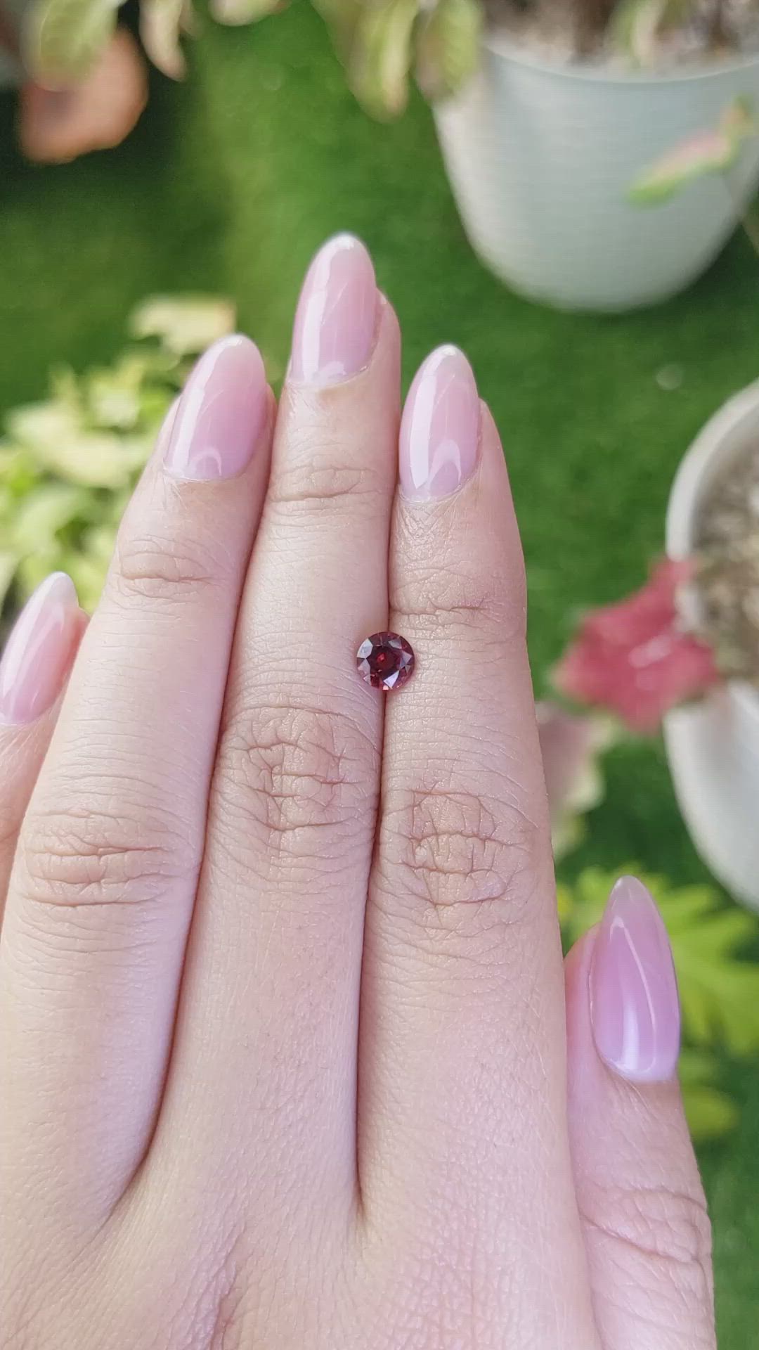 0.70 Ct. Orangish Red Garnet from Ceylon (Sri Lanka) Size Video