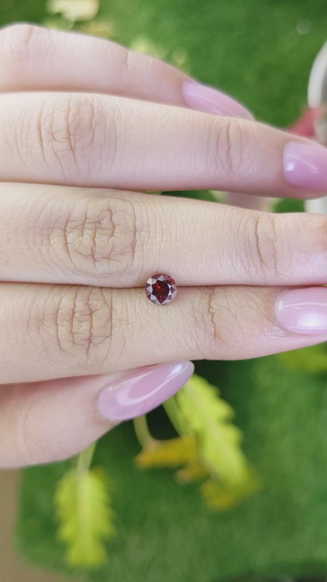 0.70 Ct. Orangish Red Garnet from Ceylon (Sri Lanka) Size Video