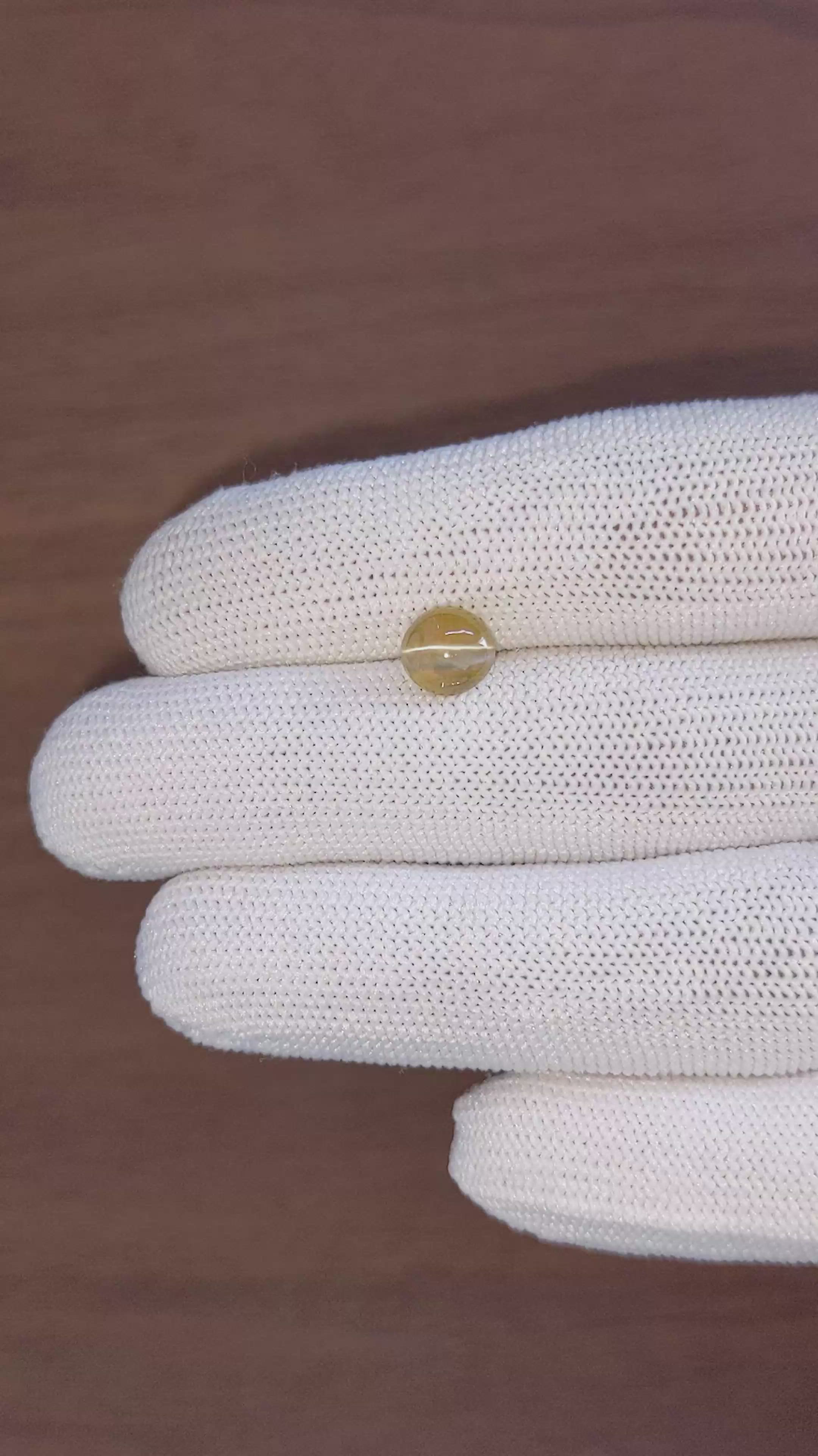 2.12 Ct. Greenish Yellow Cabochon Chrysoberyl from Madagascar Size Video
