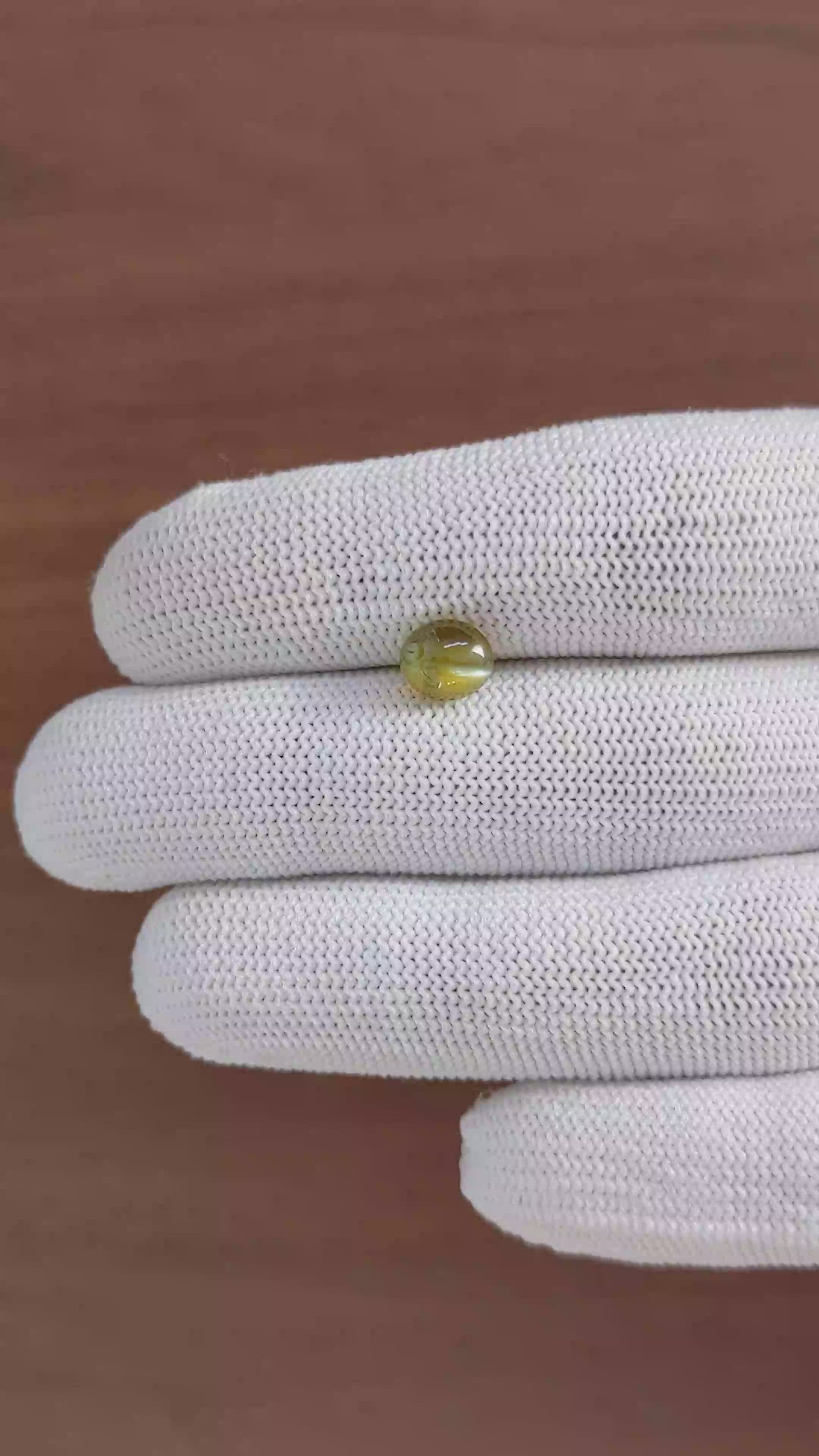 2.32 Ct. Yellowish Green Cabochon Chrysoberyl from Tanzania Size Video
