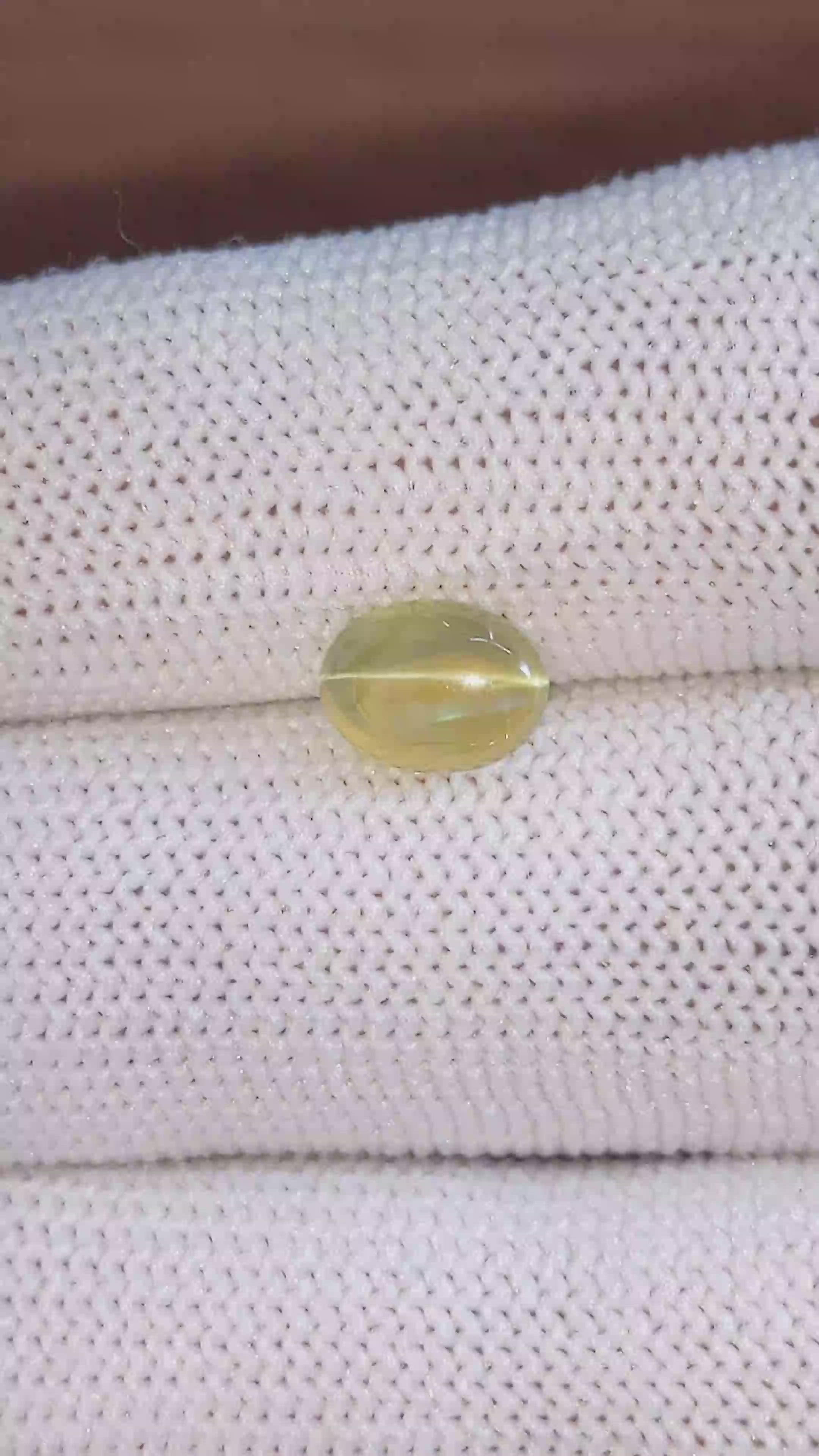 2.19 Ct. Yellowish Green Cabochon Chrysoberyl from Madagascar Size Video