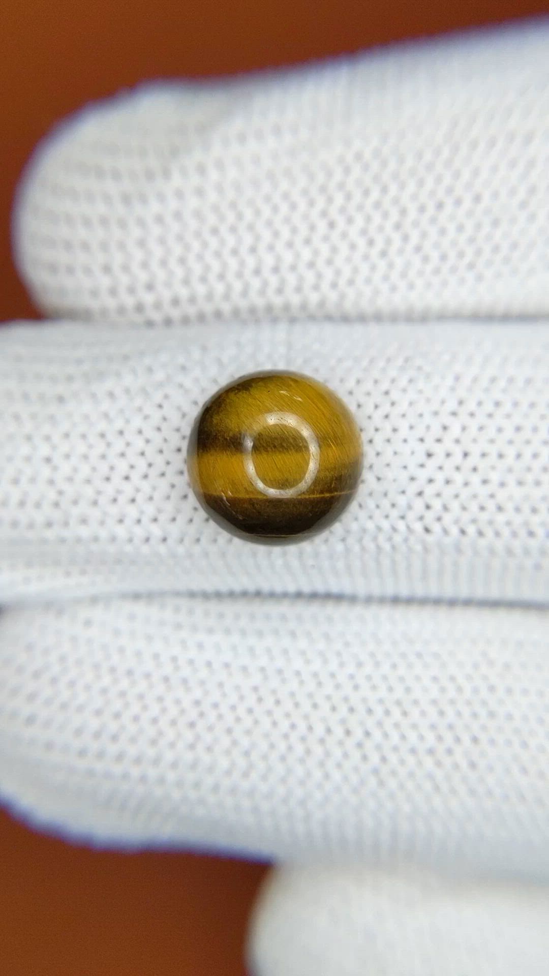 4.09 Ct. Cabochon Tiger's Eye from Ceylon (Sri Lanka) Size Video