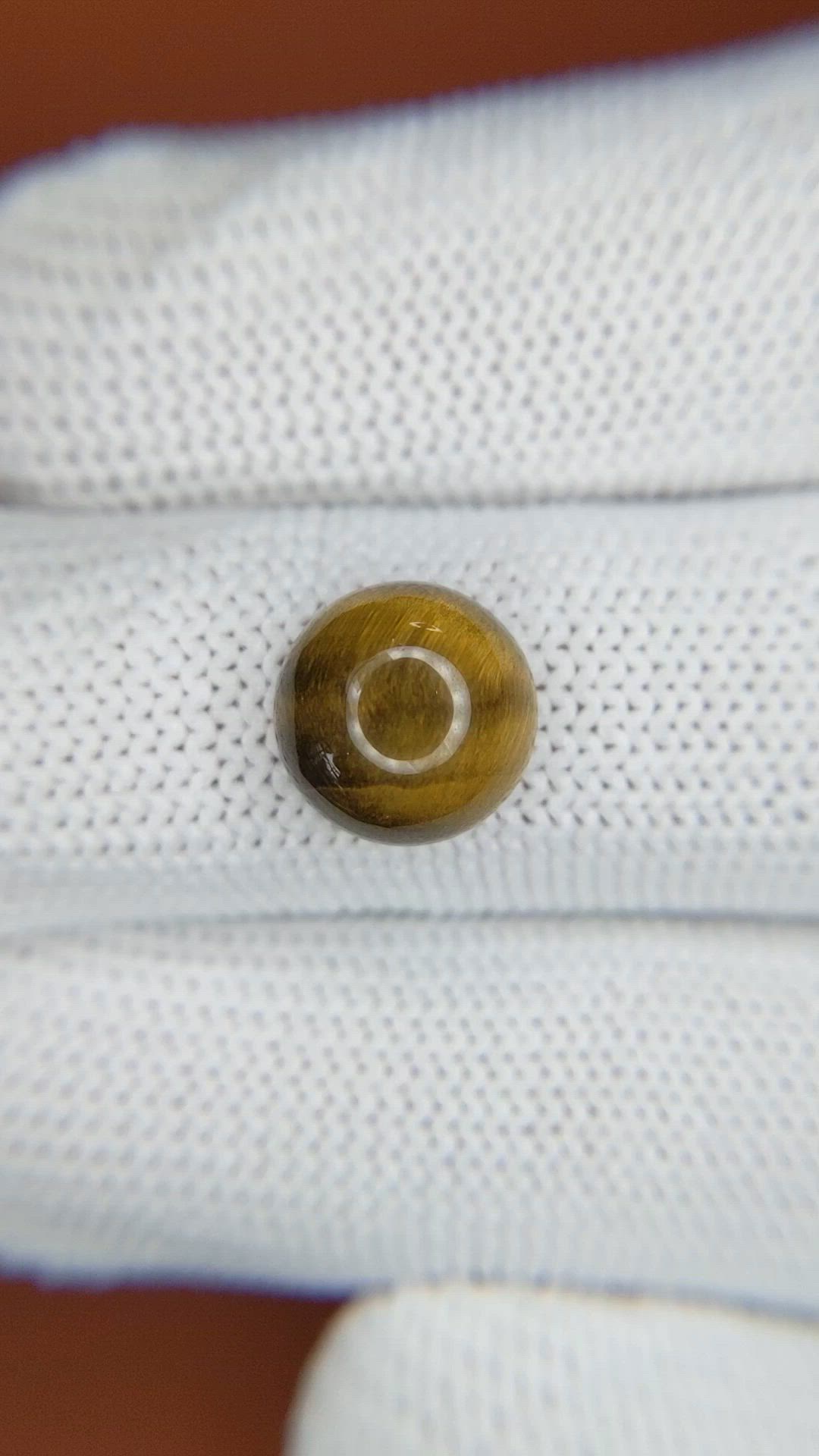 4.19 Ct. Cabochon Tiger's Eye from Ceylon (Sri Lanka) Size Video