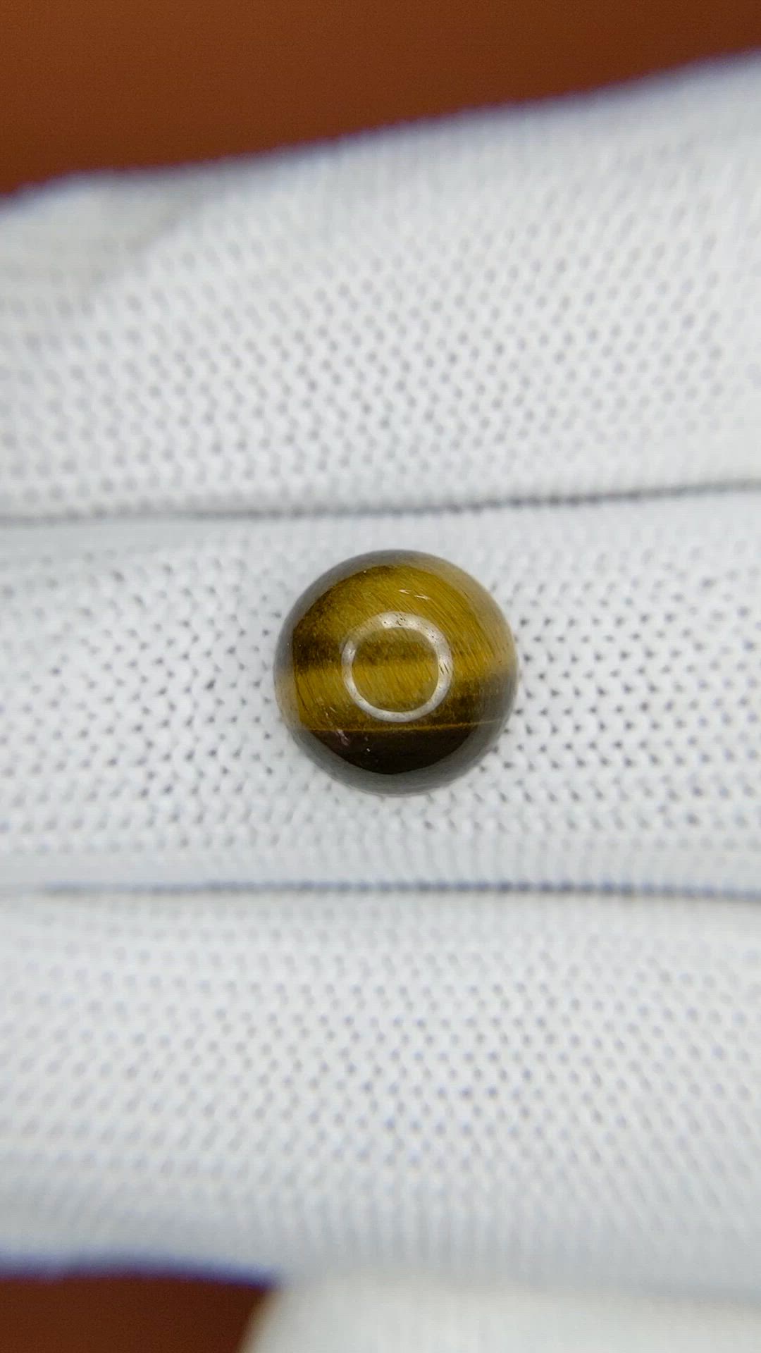 4.31 Ct. Cabochon Tiger's Eye from Ceylon (Sri Lanka) Size Video