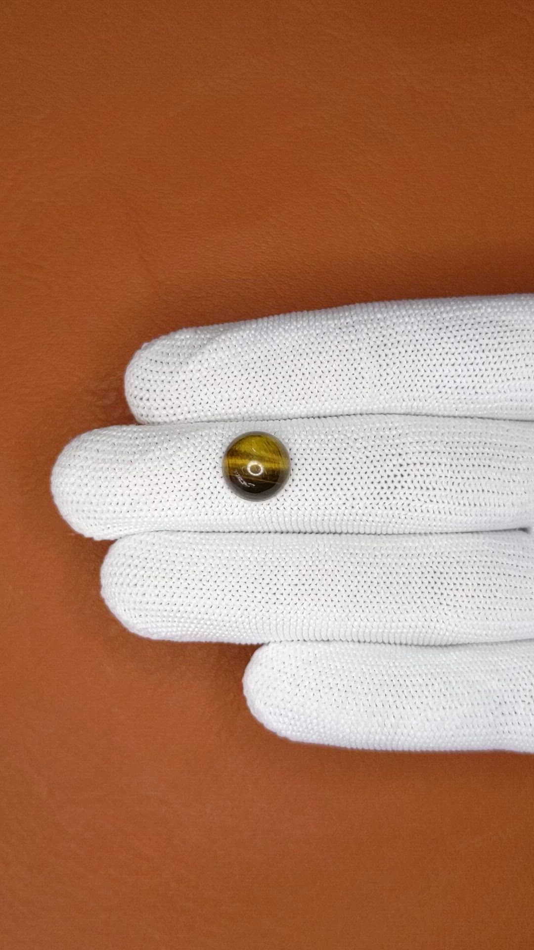 4.31 Ct. Cabochon Tiger's Eye from Ceylon (Sri Lanka) Size Video