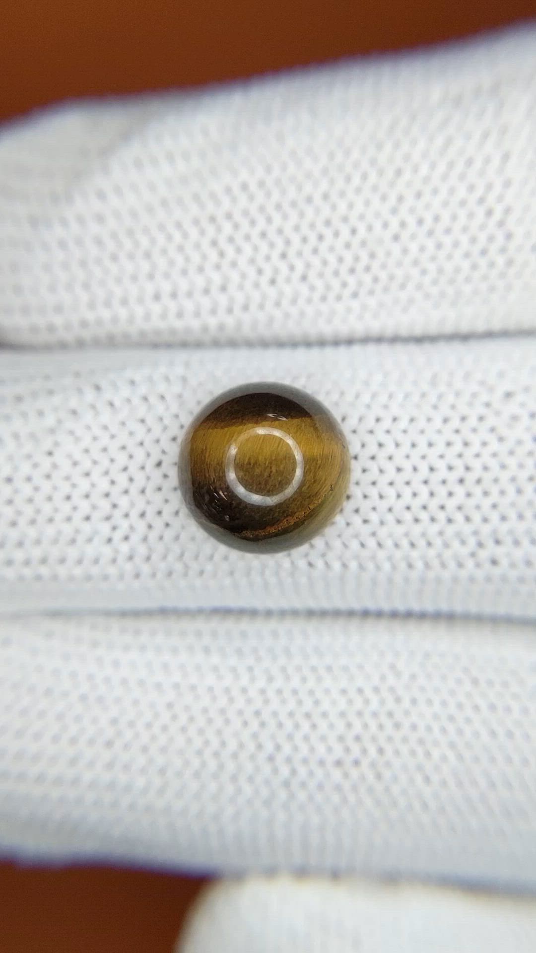 4.36 Ct. Cabochon Tiger's Eye from Ceylon (Sri Lanka) Size Video