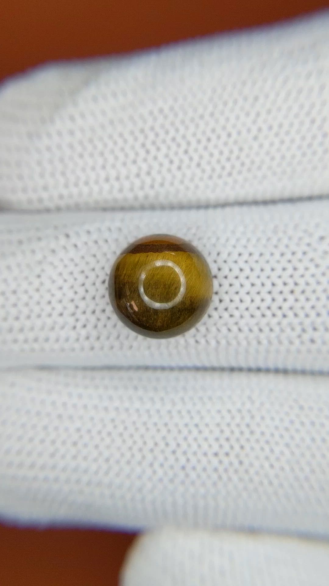 4.37 Ct. Cabochon Tiger's Eye from Ceylon (Sri Lanka) Size Video