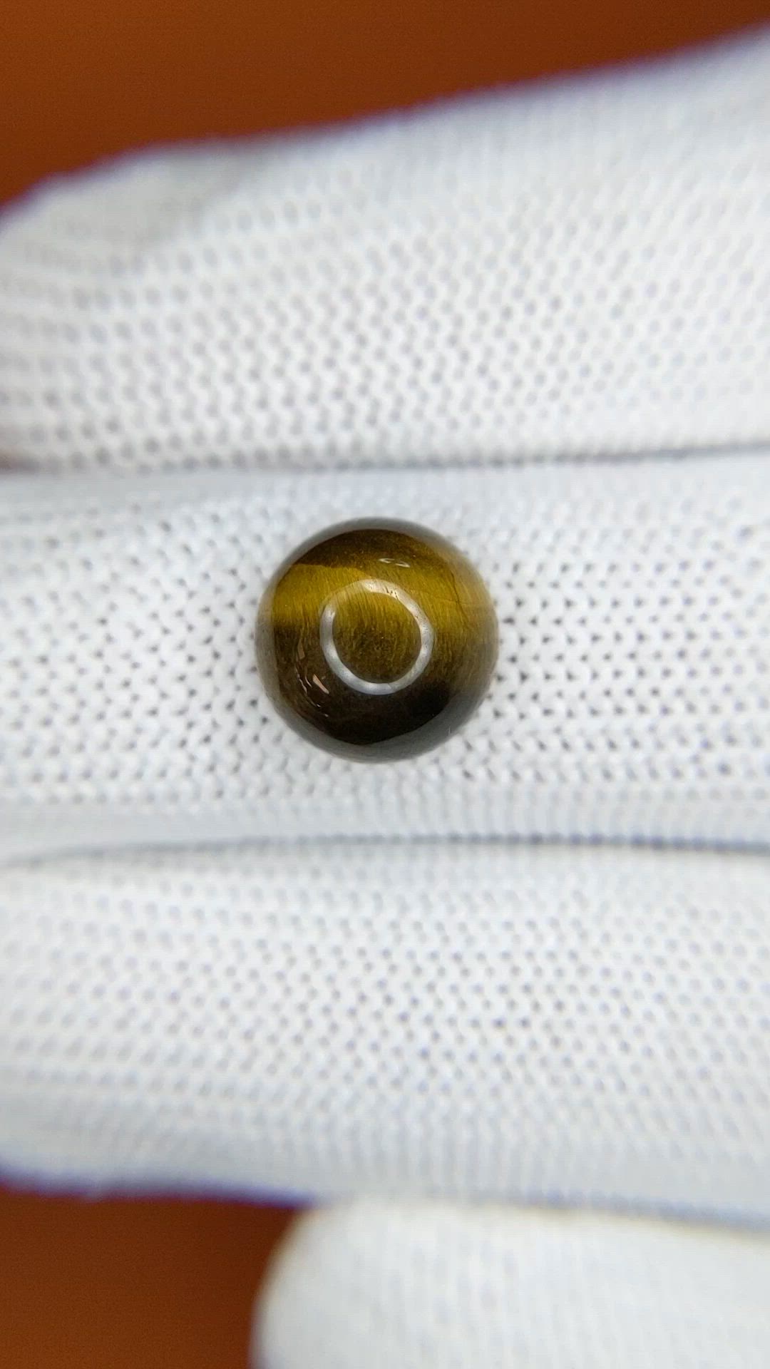4.37 Ct. Cabochon Tiger's Eye from Ceylon (Sri Lanka) Size Video