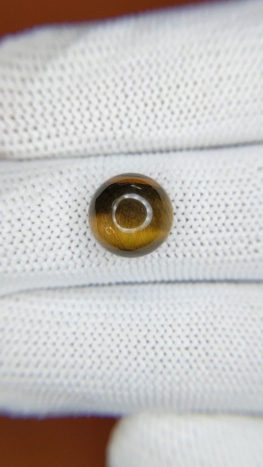4.39 Ct. Cabochon Tiger's Eye from Ceylon (Sri Lanka) Size Video
