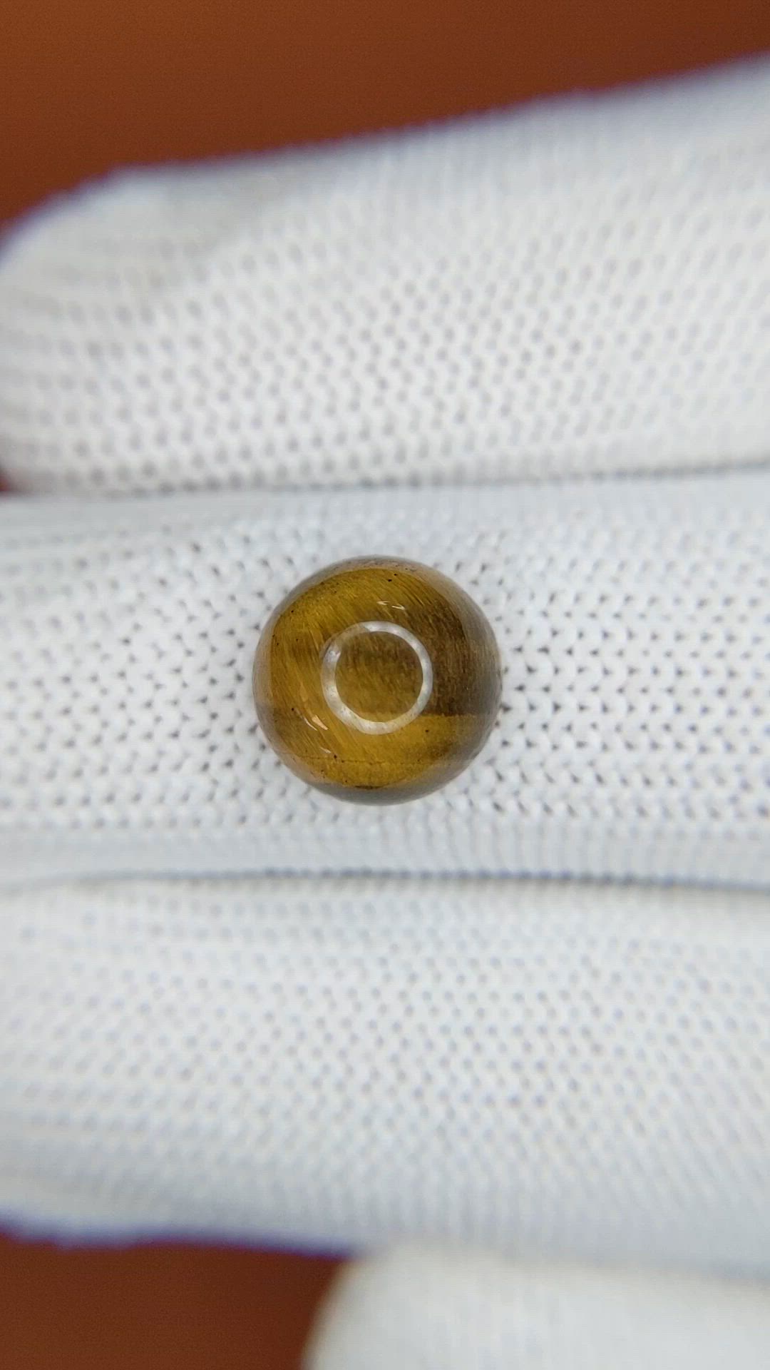 4.45 Ct. Cabochon Tiger's Eye from Ceylon (Sri Lanka) Size Video