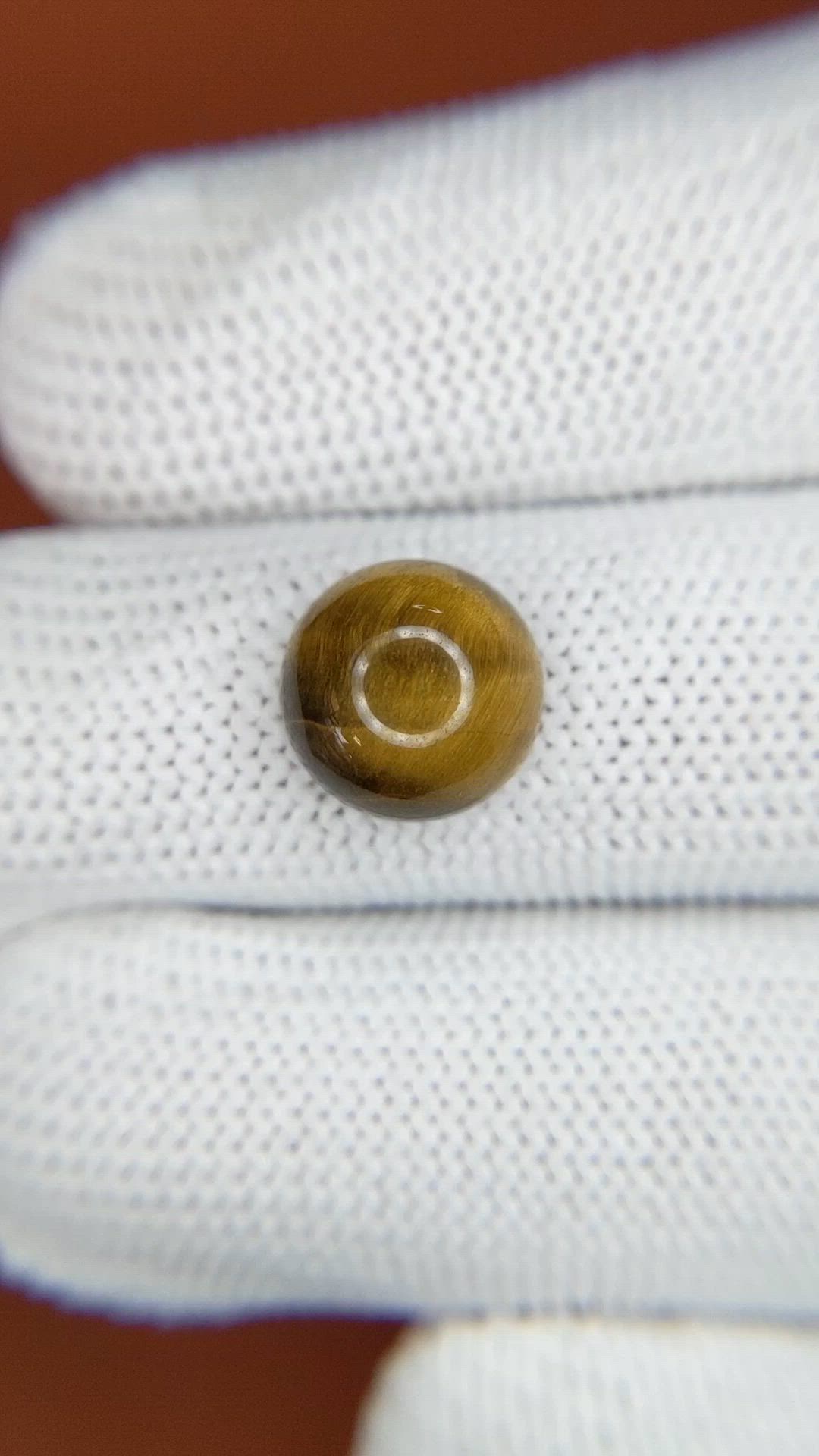 4.53 Ct. Cabochon Tiger's Eye from Ceylon (Sri Lanka) Size Video