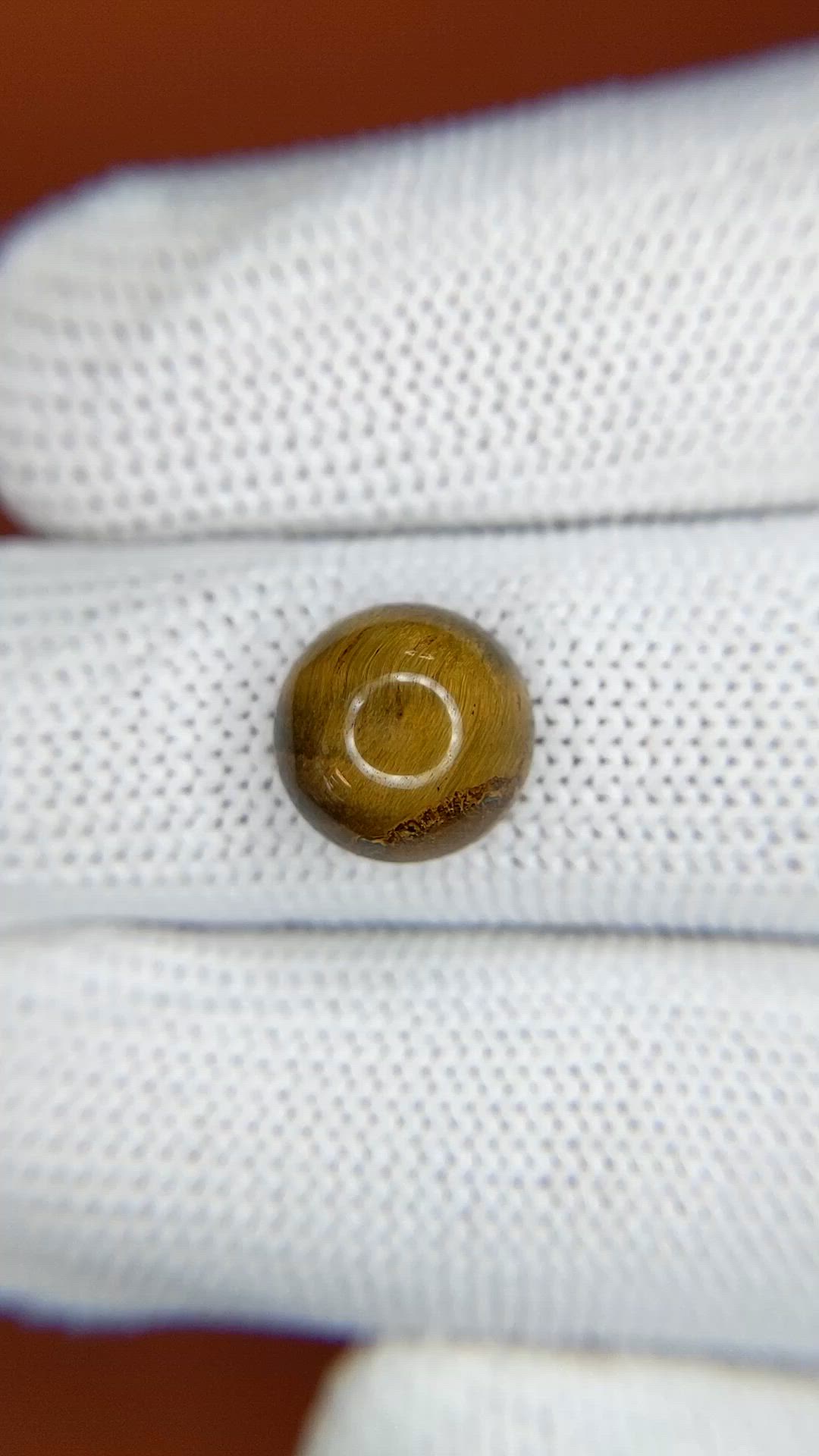 4.56 Ct. Cabochon Tiger's Eye from Ceylon (Sri Lanka) Size Video