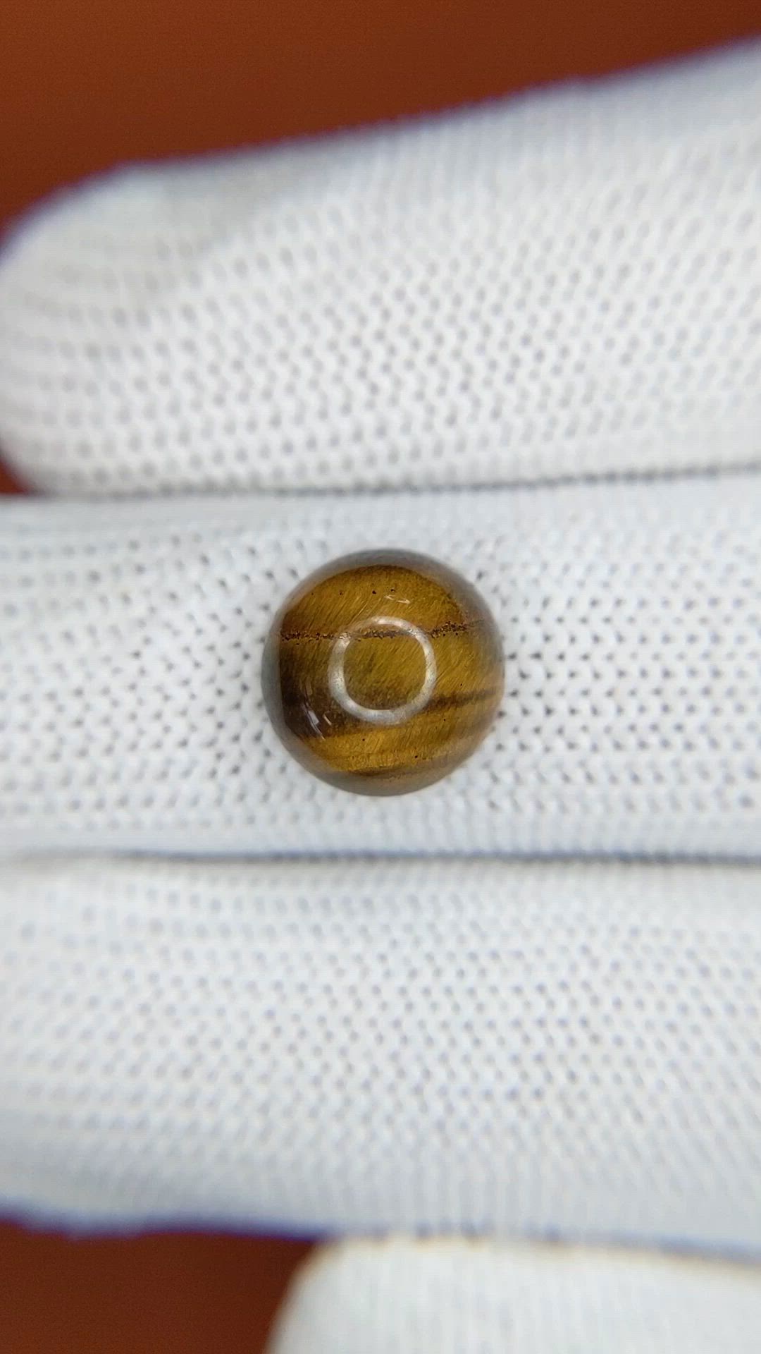 4.61 Ct. Cabochon Tiger's Eye from Ceylon (Sri Lanka) Size Video