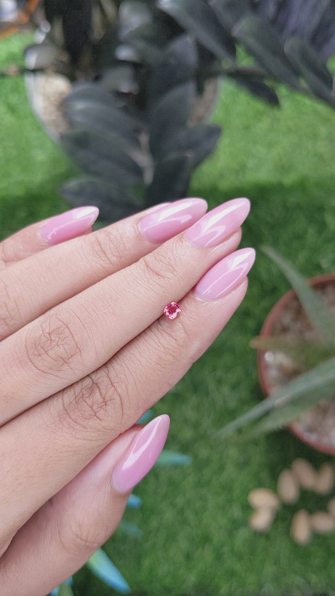 0.19 Ct. Orangish Pink Spinel from Tanzania Size Video