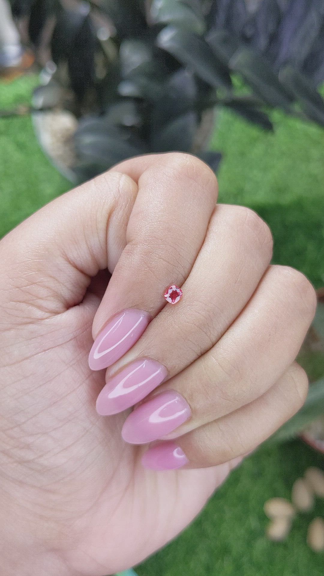 0.19 Ct. Orangish Pink Spinel from Tanzania Size Video