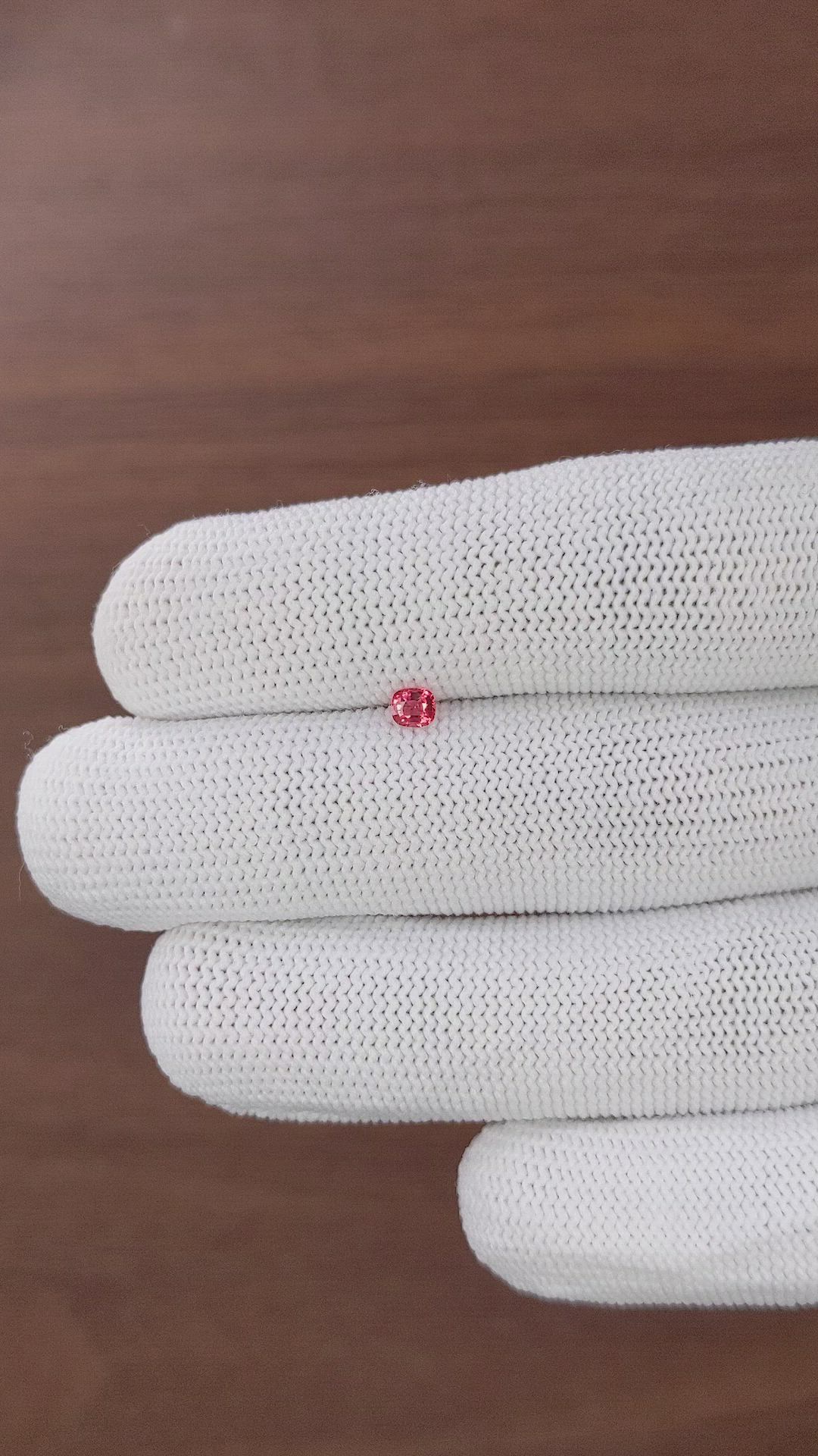 0.19 Ct. Orangish Pink Spinel from Tanzania Size Video
