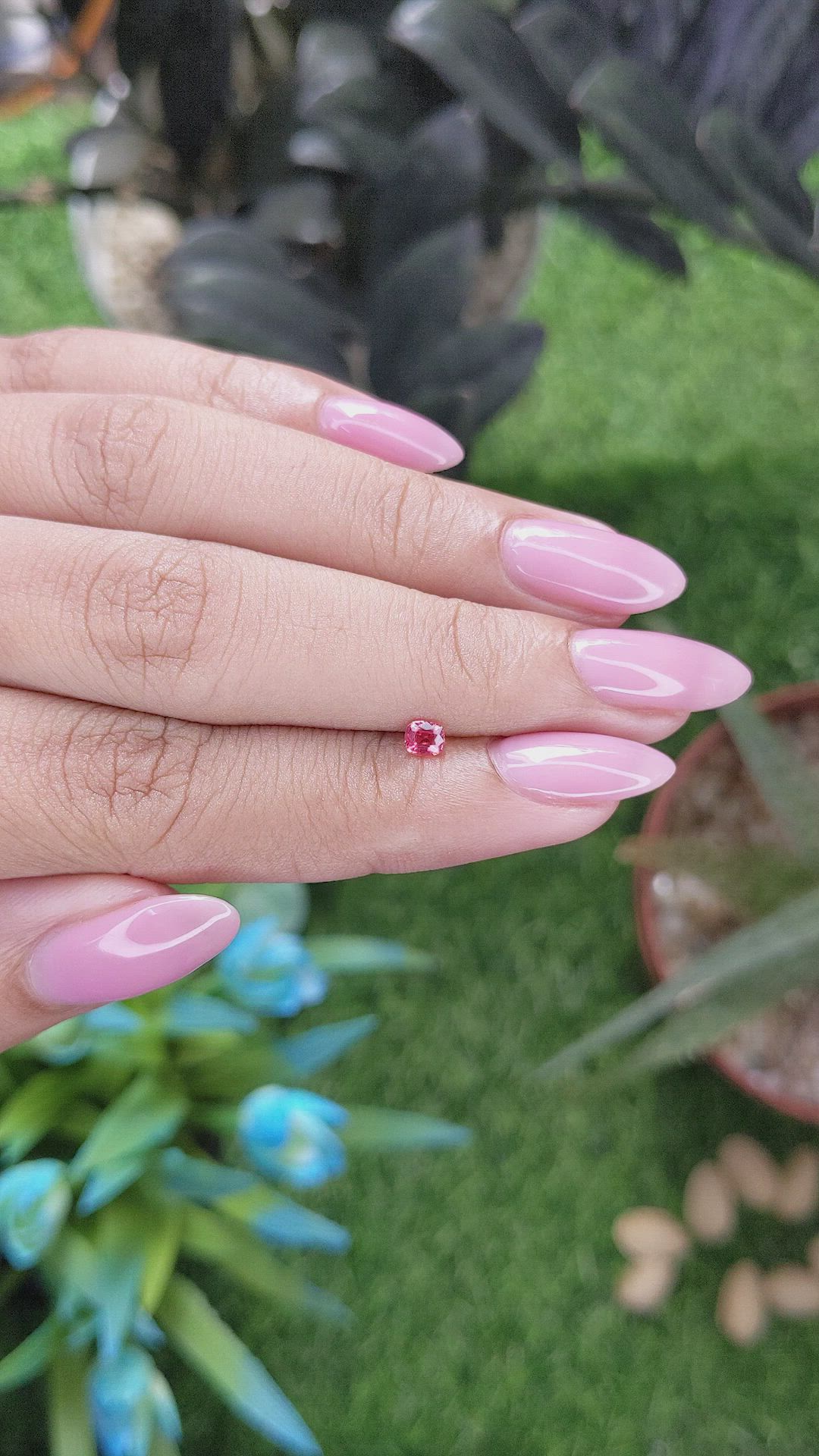 0.19 Ct. Orangish Pink Spinel from Tanzania Size Video