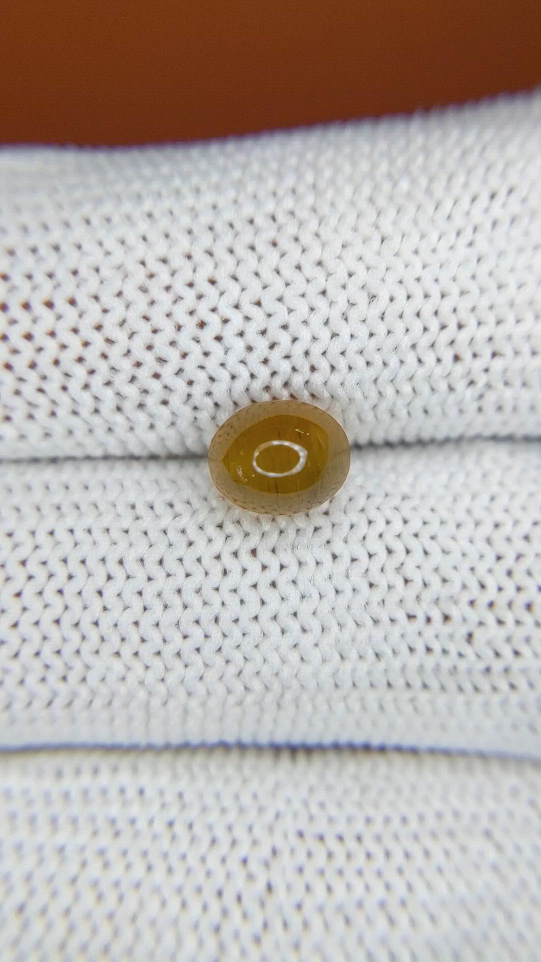 2.07 Ct. Yellowish Brown Cabochon Chrysoberyl from Ceylon (Sri Lanka) Size Video