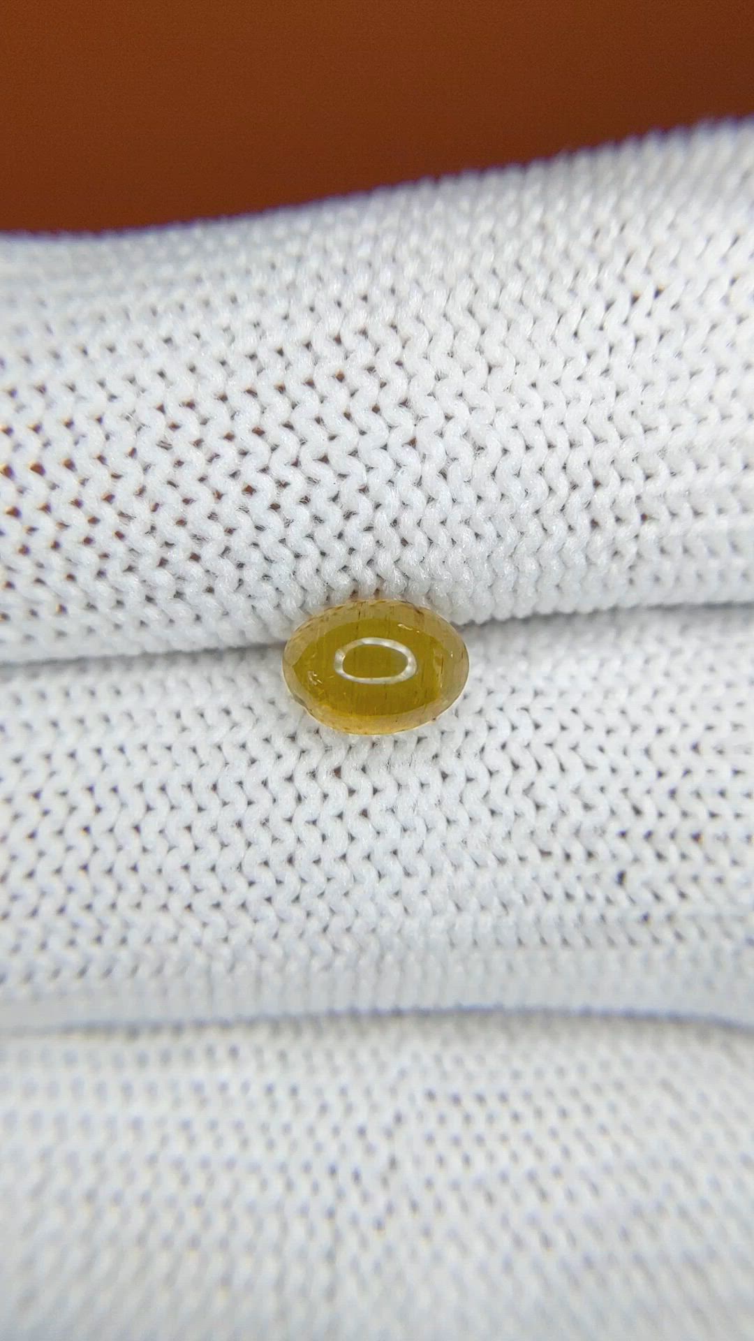1.56 Ct. Greenish Yellow Cabochon Chrysoberyl from Ceylon (Sri Lanka) Size Video