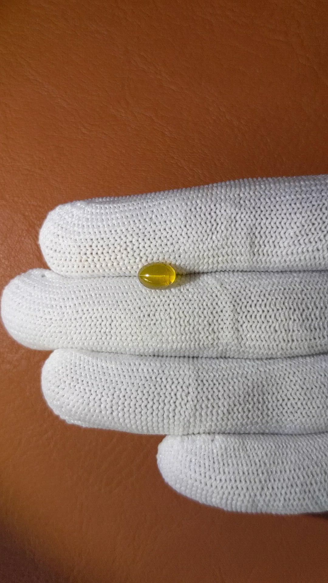 1.56 Ct. Greenish Yellow Cabochon Chrysoberyl from Ceylon (Sri Lanka) Size Video