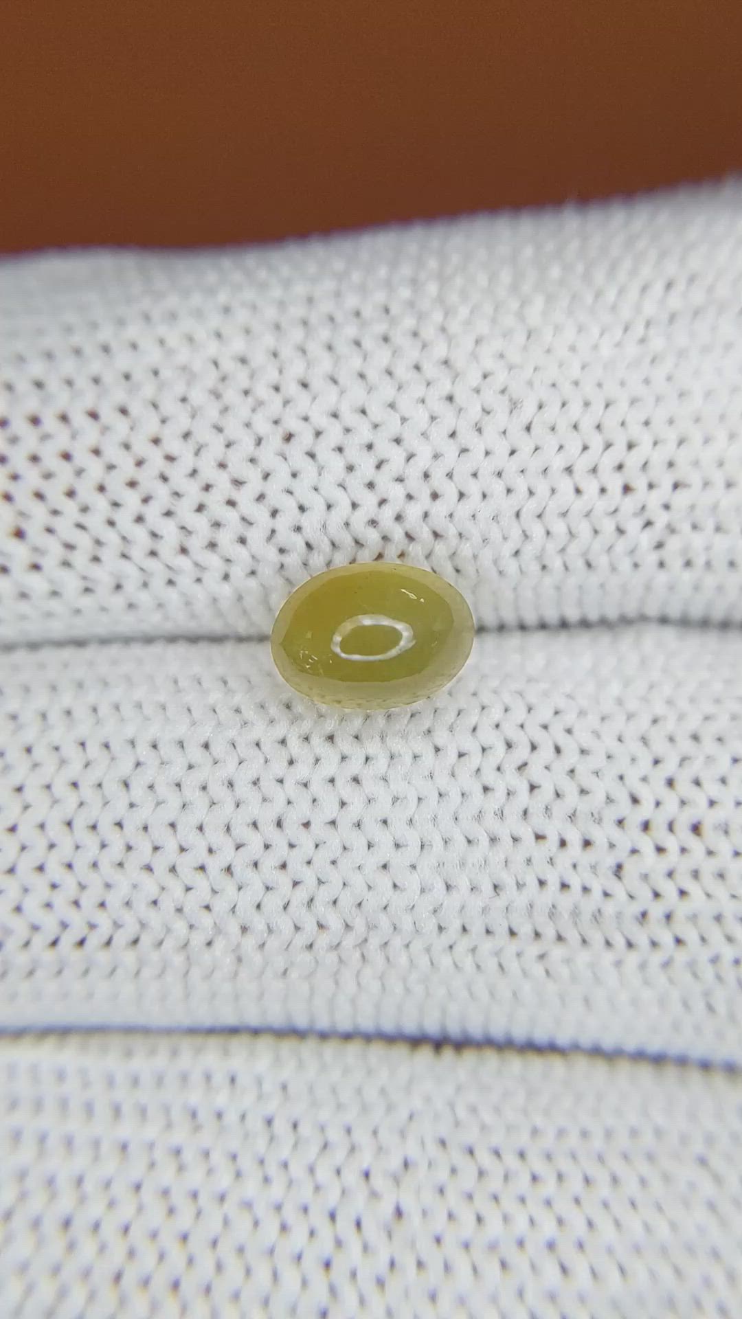 2.30 Ct. Yellowish Green Cabochon Chrysoberyl from Ceylon (Sri Lanka) Size Video