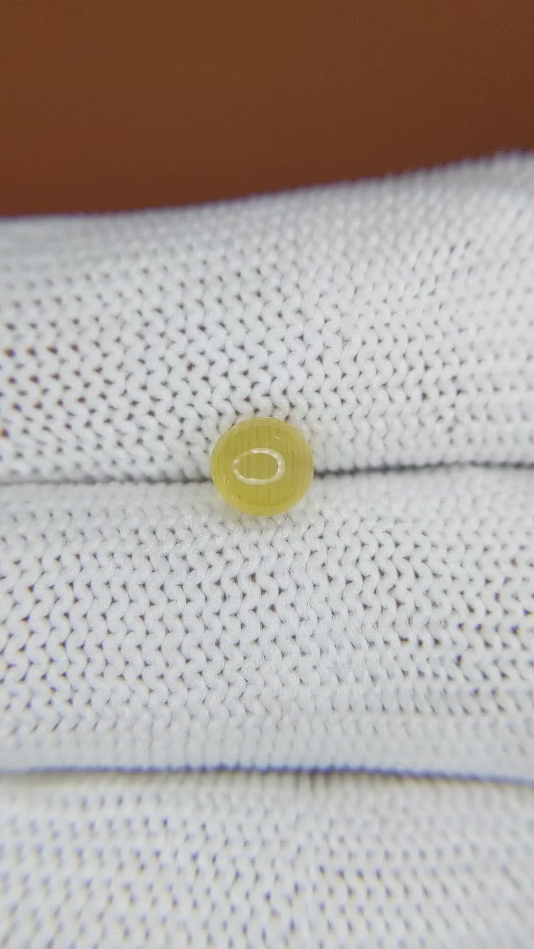 0.98 Ct. Yellow Cabochon Chrysoberyl from Ceylon (Sri Lanka) Size Video