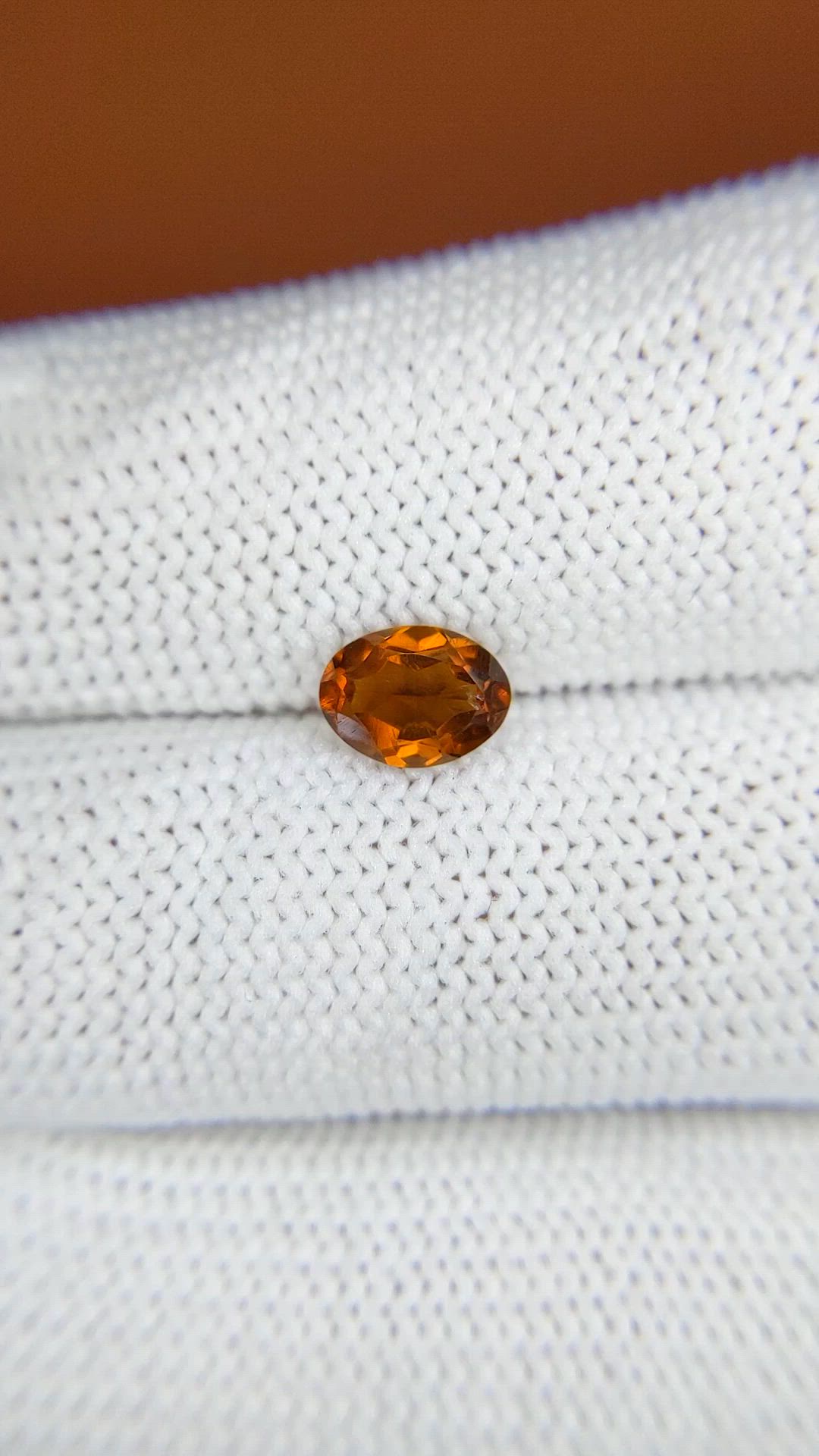0.68 Ct. Orange Hessonite Garnet from Madagascar Size Video