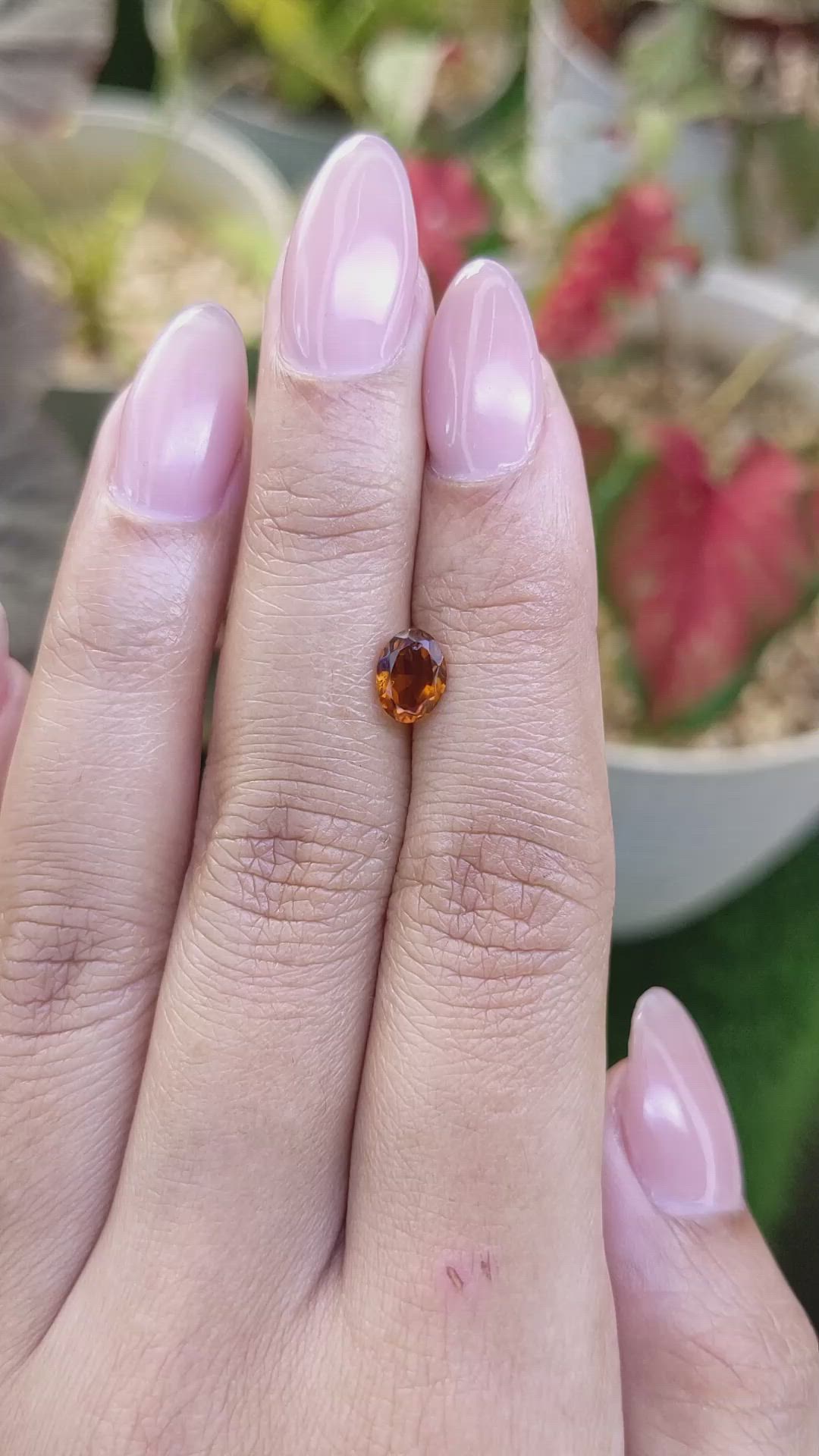 0.68 Ct. Orange Hessonite Garnet from Madagascar Size Video