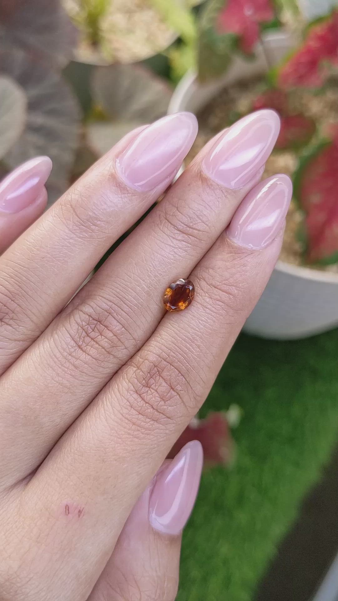 0.68 Ct. Orange Hessonite Garnet from Madagascar Size Video