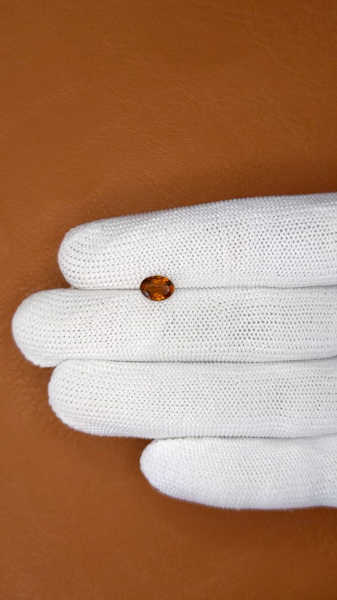 0.68 Ct. Orange Hessonite Garnet from Madagascar Size Video