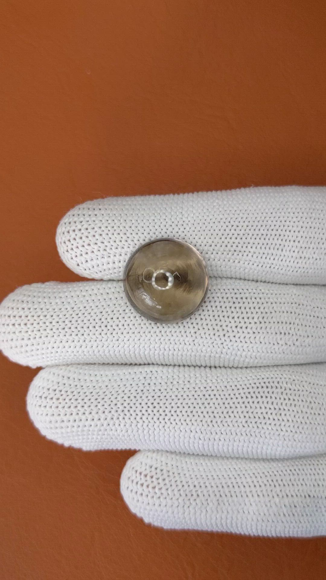 14.23 Ct. Brown Cabochon Smokey Quartz from Ceylon (Sri Lanka) Size Video