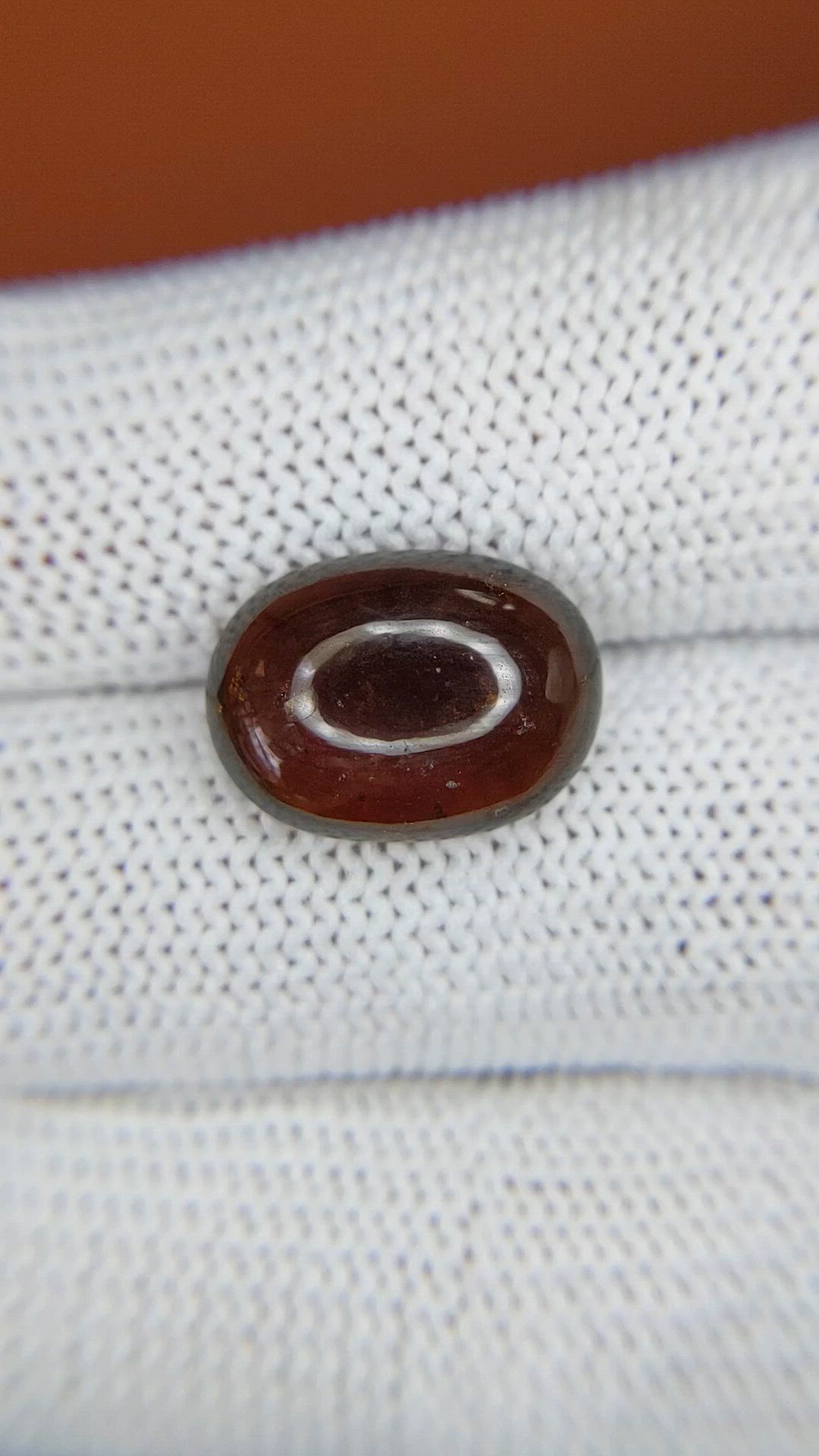 8.50 Ct. Orangish Brown Cabochon Garnet from Ceylon (Sri Lanka) Size Video