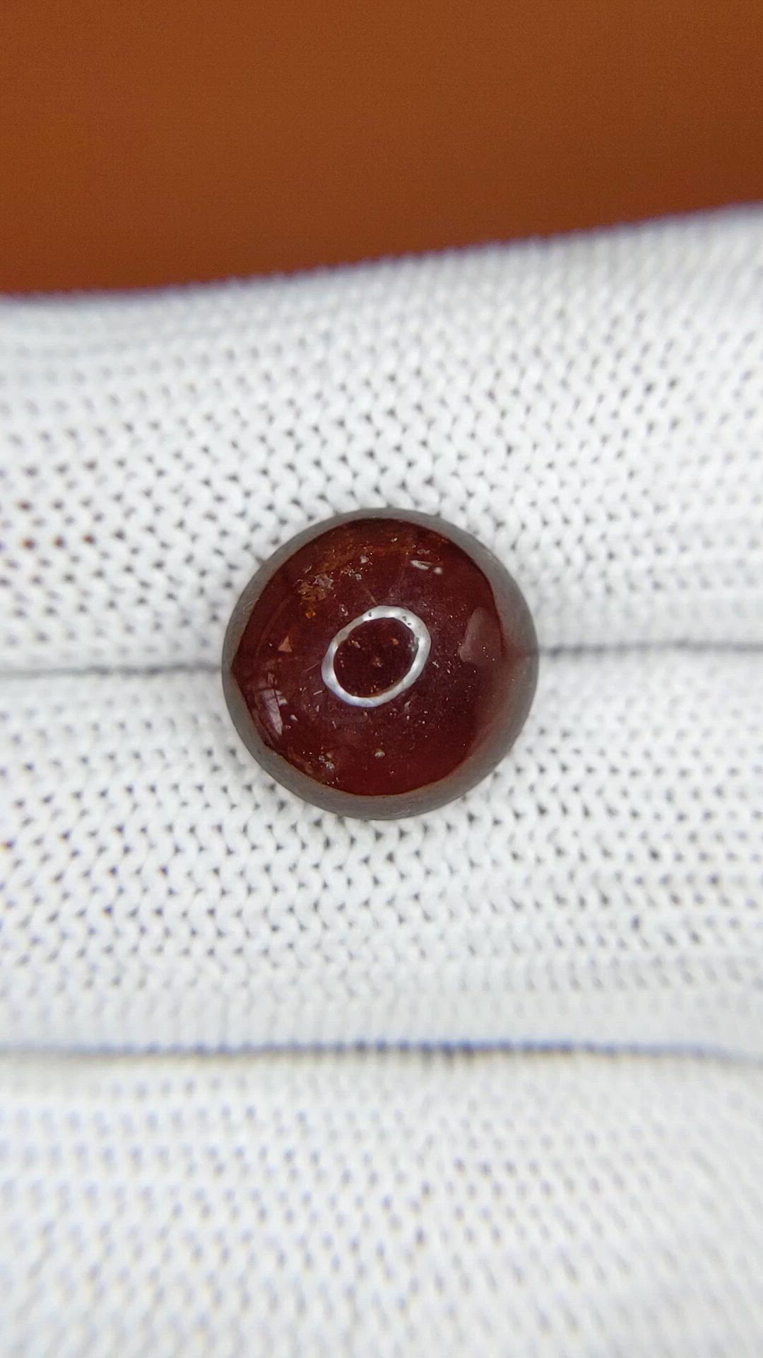 8.77 Ct. Orangish Red Cabochon Garnet from Ceylon (Sri Lanka) Size Video