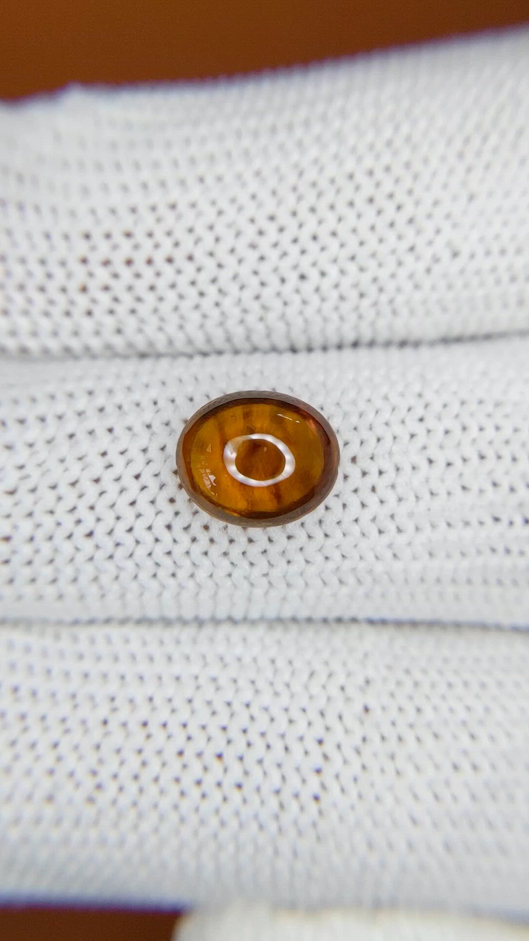 2.57 Ct. Yellowish Orange Cabochon Hessonite Garnet from Madagascar Size Video