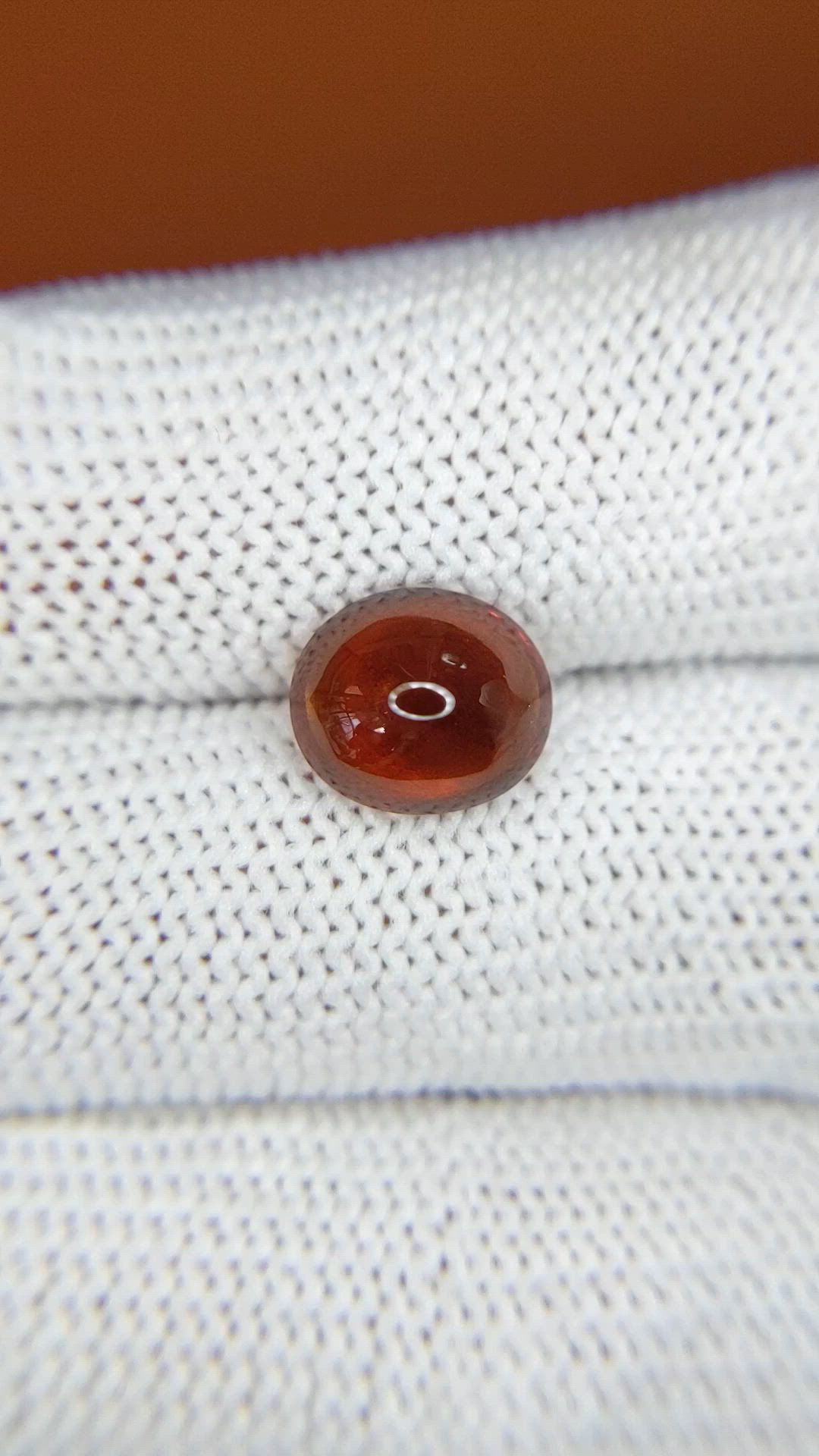 3.73 Ct. Reddish Orange Cabochon Hessonite Garnet from Madagascar Size Video