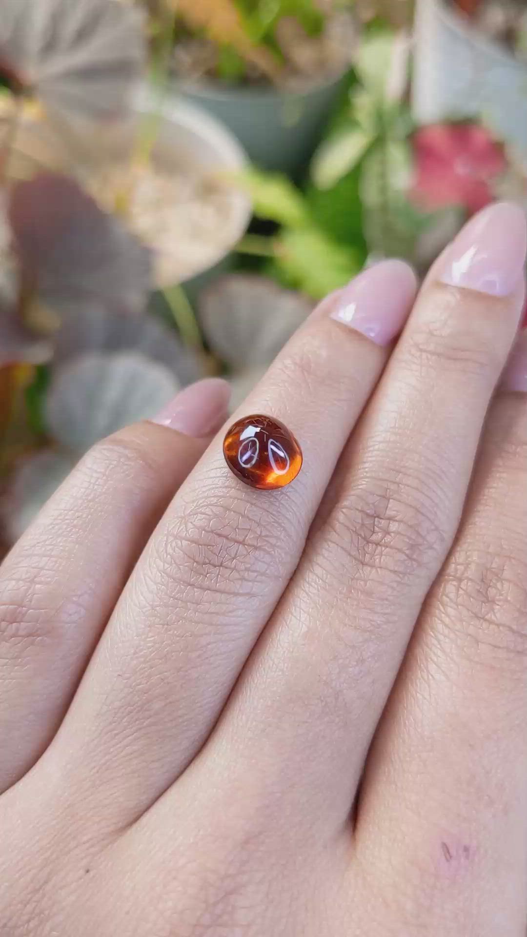 3.73 Ct. Reddish Orange Cabochon Hessonite Garnet from Madagascar Size Video