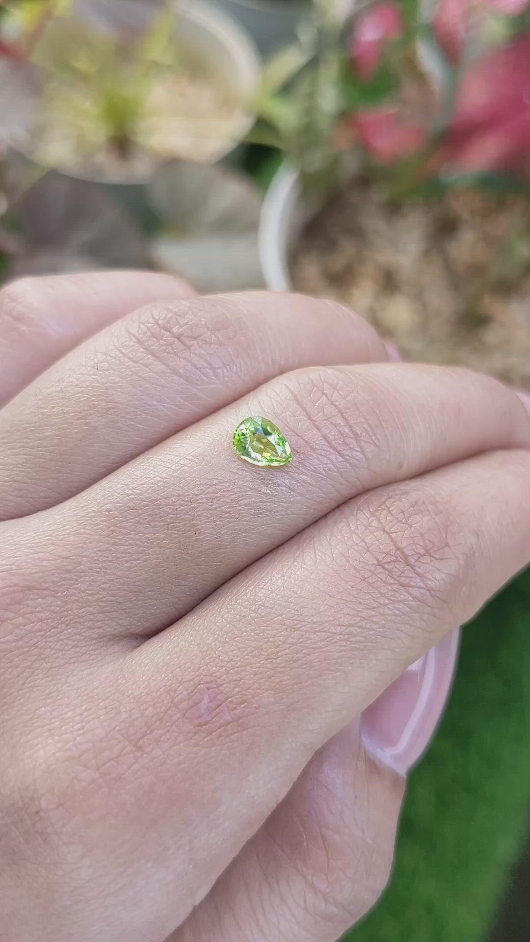0.57 Ct. Yellowish Green Peridot from Pakistan Size Video