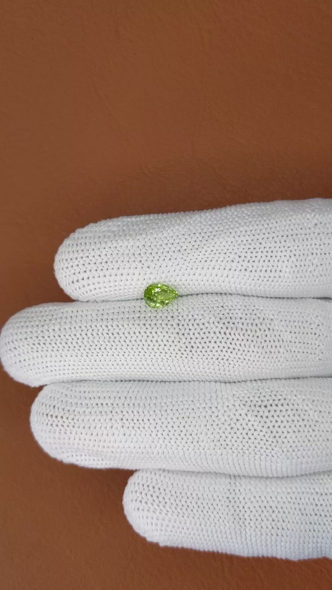 0.57 Ct. Yellowish Green Peridot from Pakistan Size Video