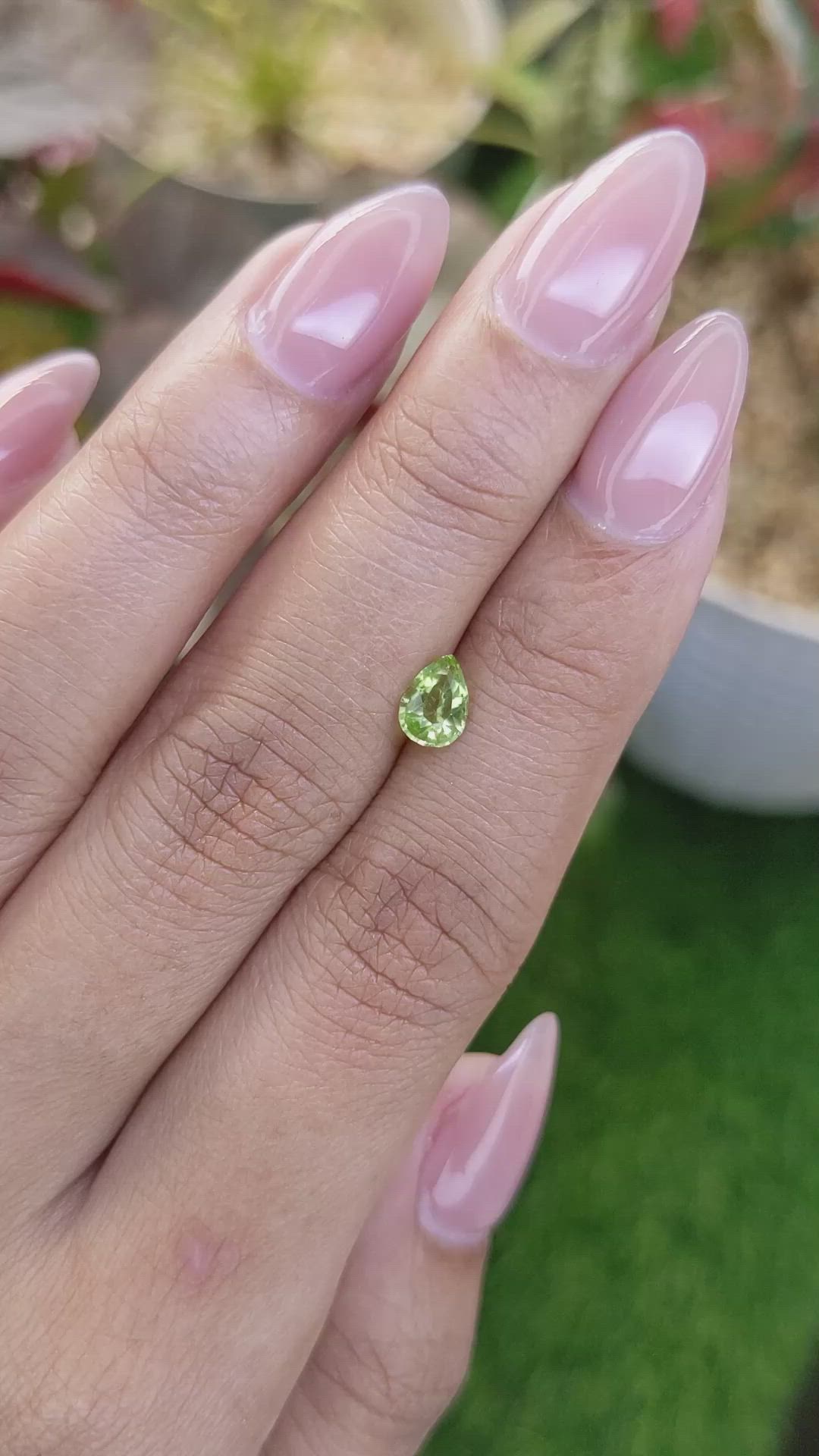 0.57 Ct. Yellowish Green Peridot from Pakistan Size Video
